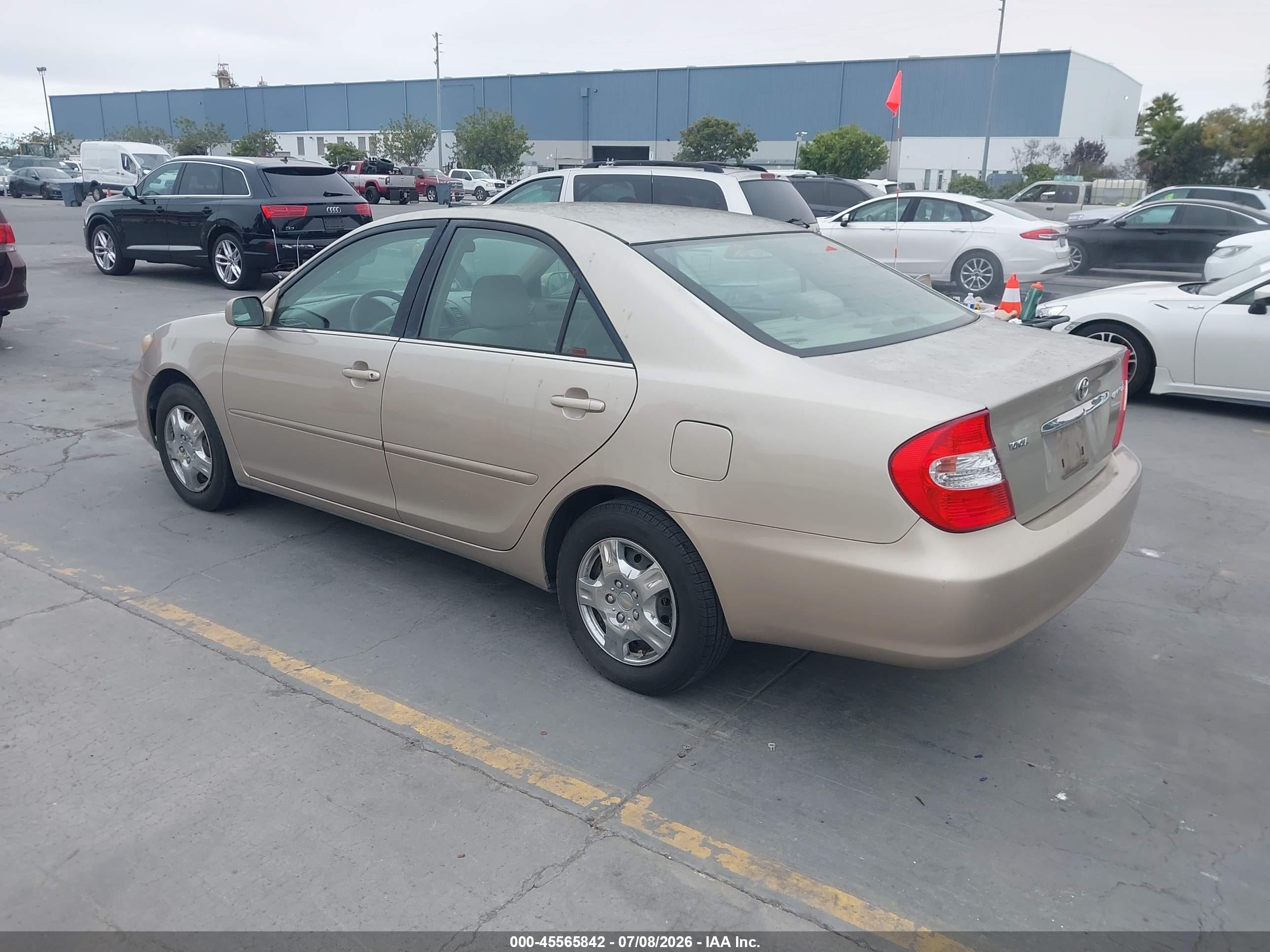 2004 Toyota Camry Le Brown vin: 4T1BE32K34U345138