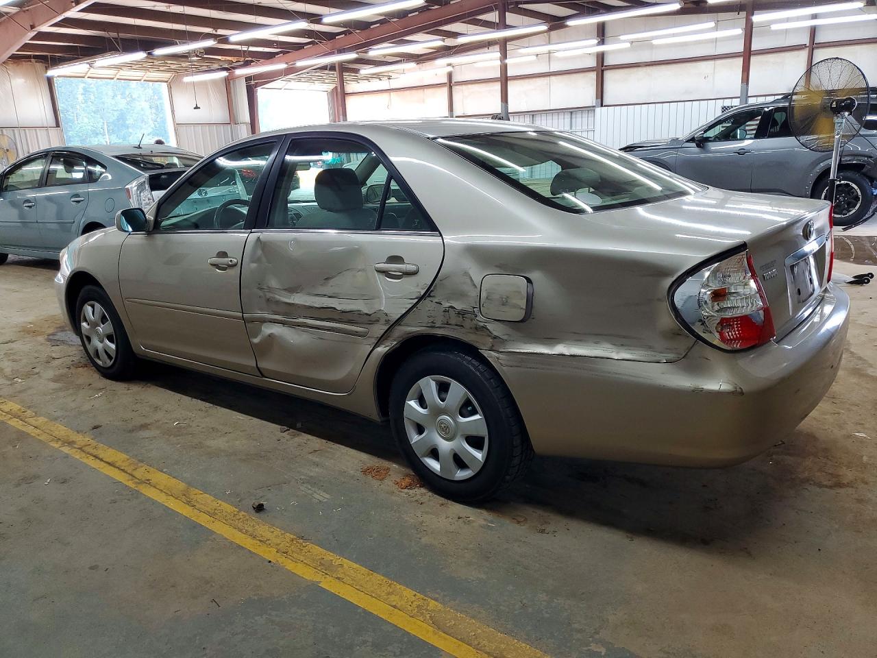 2004 Toyota Camry Le Tan vin: 4T1BE32K34U860544