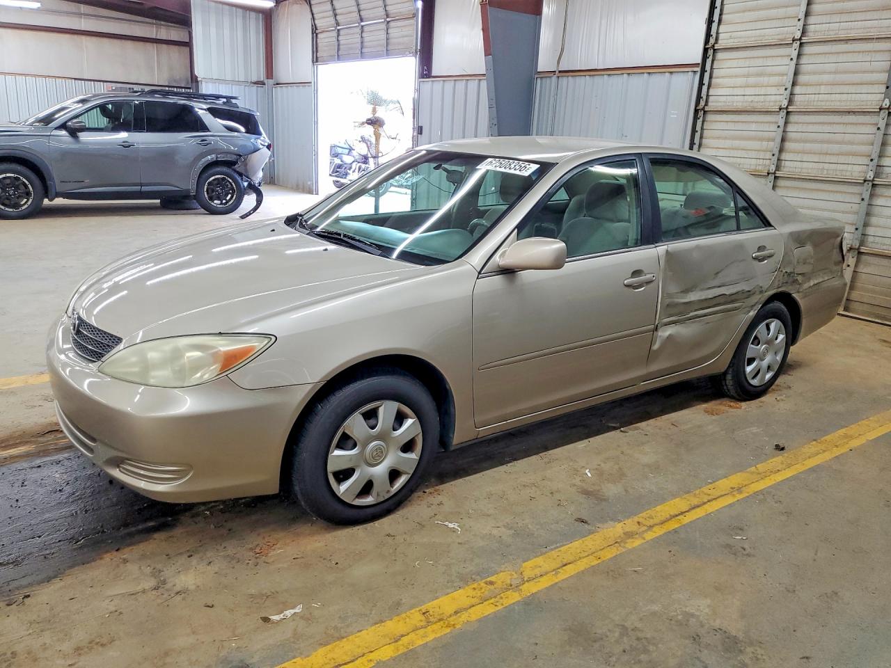 2004 Toyota Camry Le Tan vin: 4T1BE32K34U860544