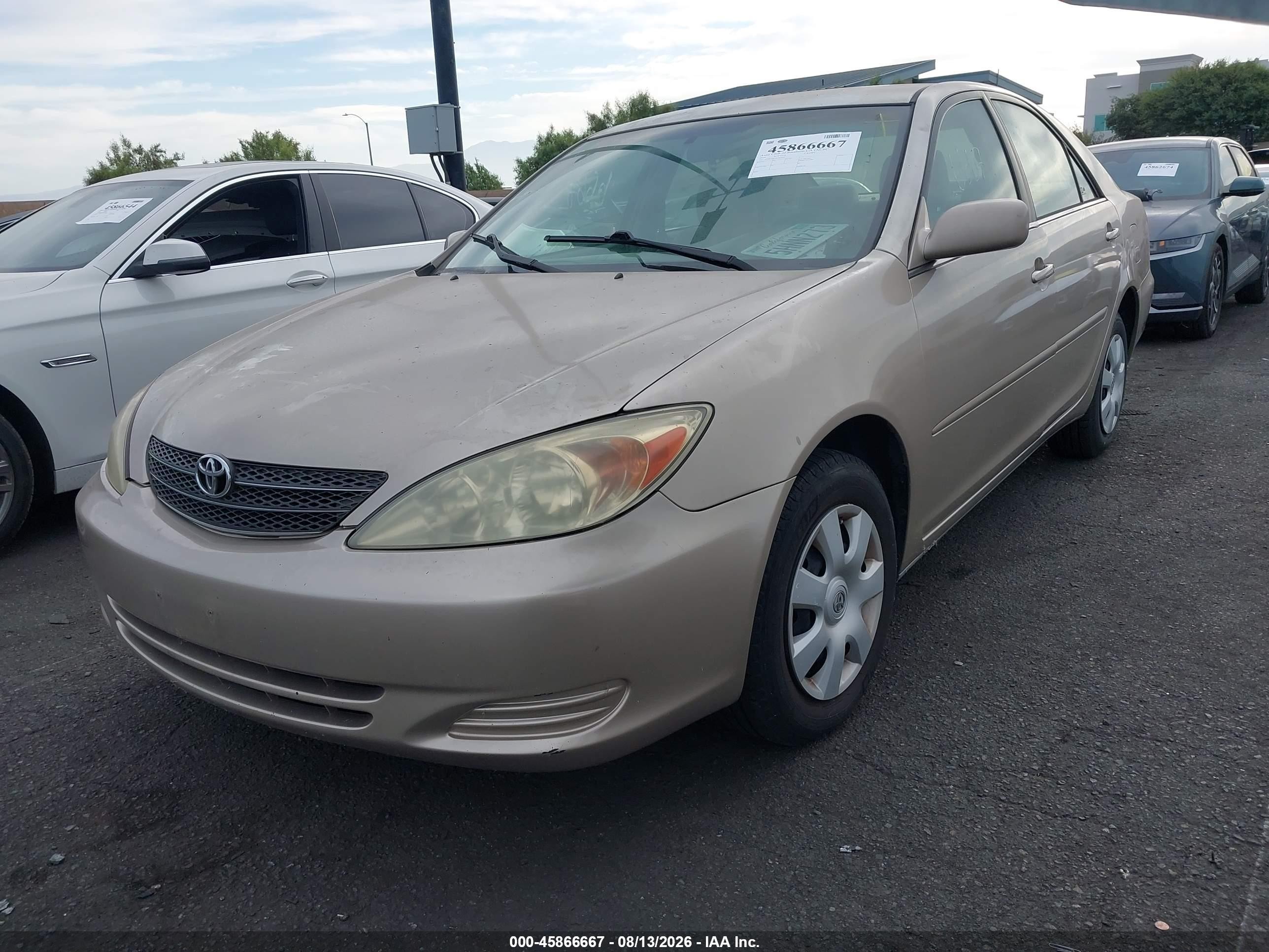 2004 Toyota Camry Le Champagne vin: 4T1BE32K34U907295