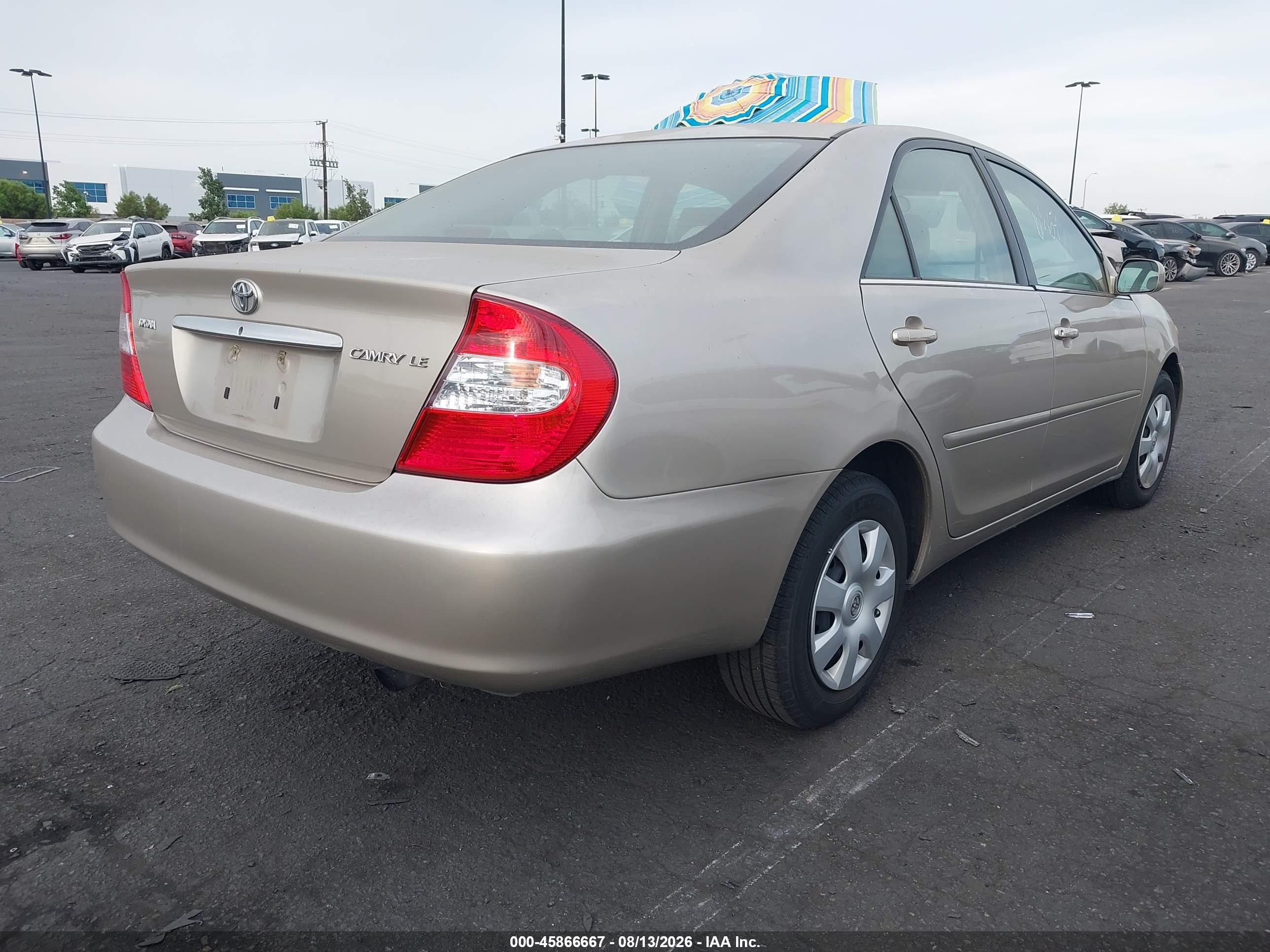 2004 Toyota Camry Le Champagne vin: 4T1BE32K34U907295