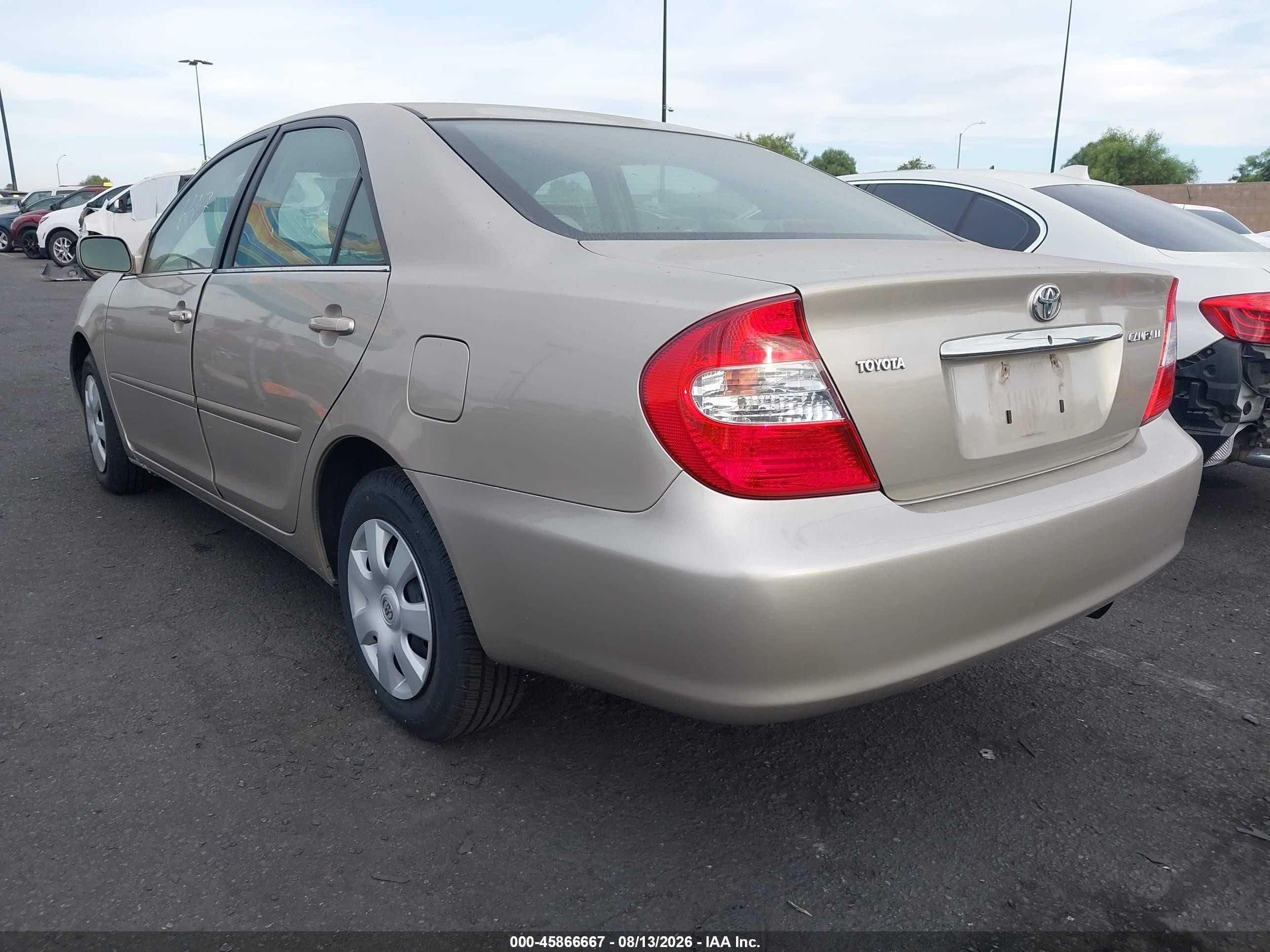 2004 Toyota Camry Le Champagne vin: 4T1BE32K34U907295