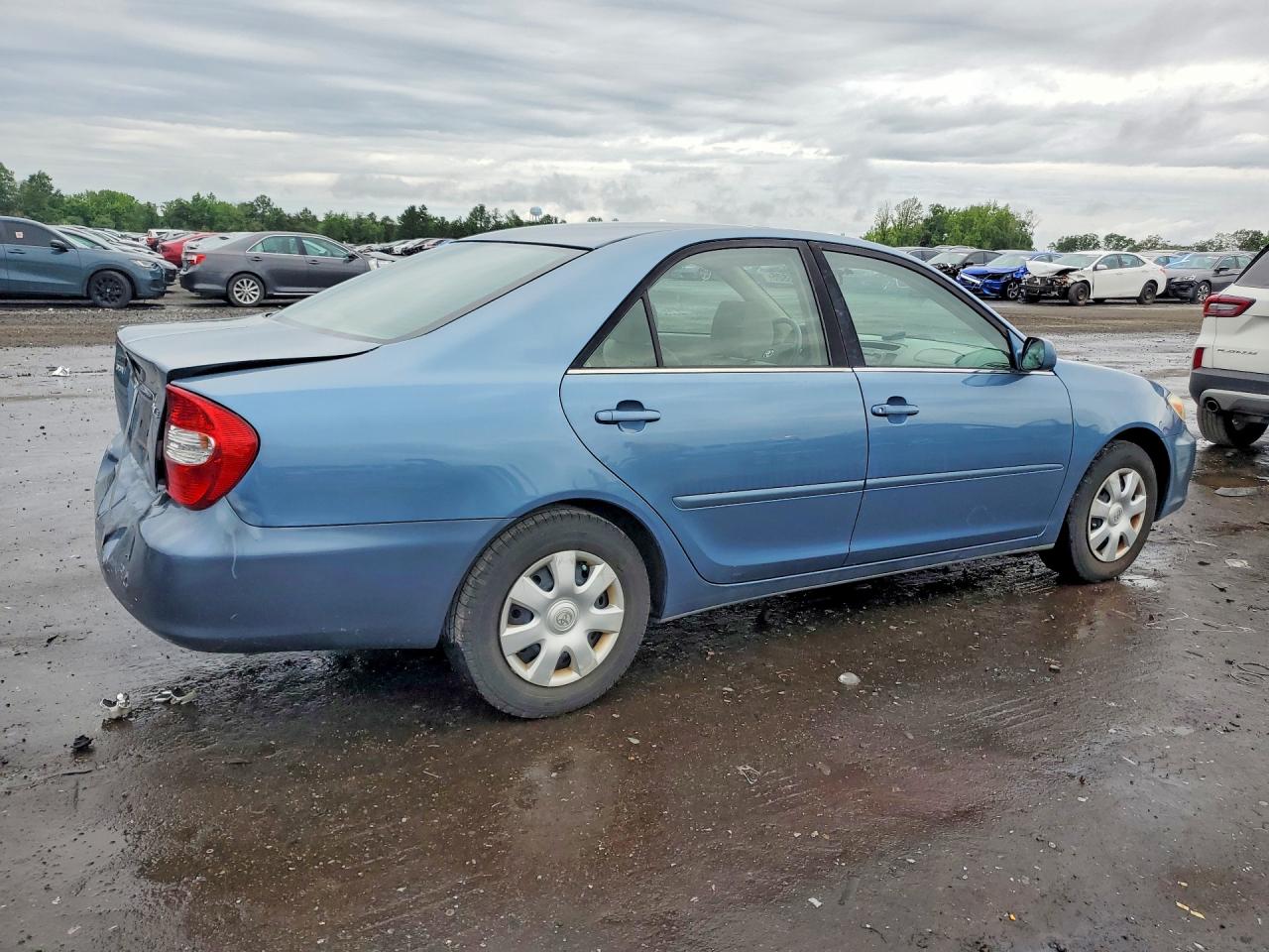 2002 Toyota Camry Le Blue vin: 4T1BE32K42U544020