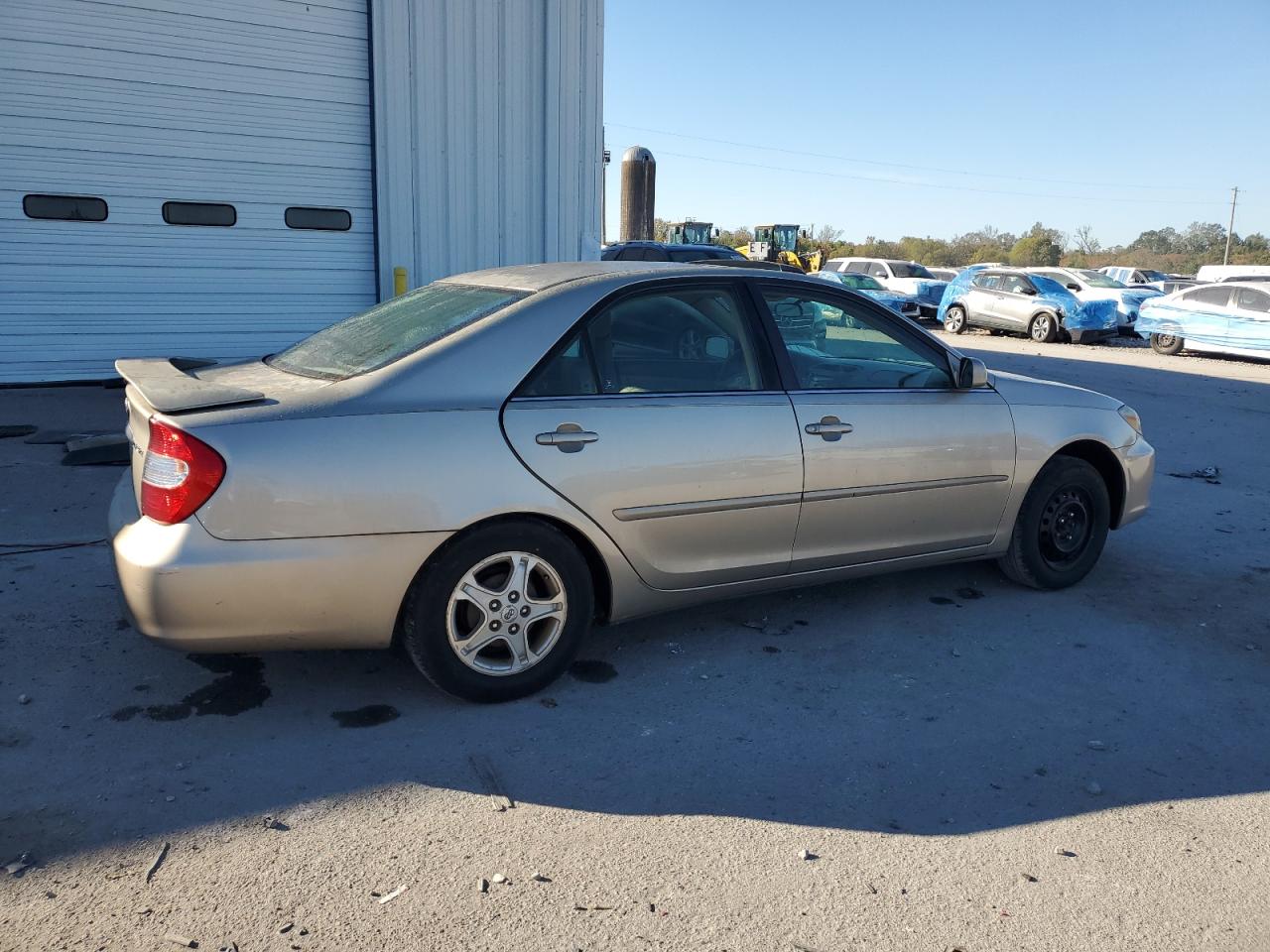 2002 Toyota Camry Le Tan vin: 4T1BE32K42U594657