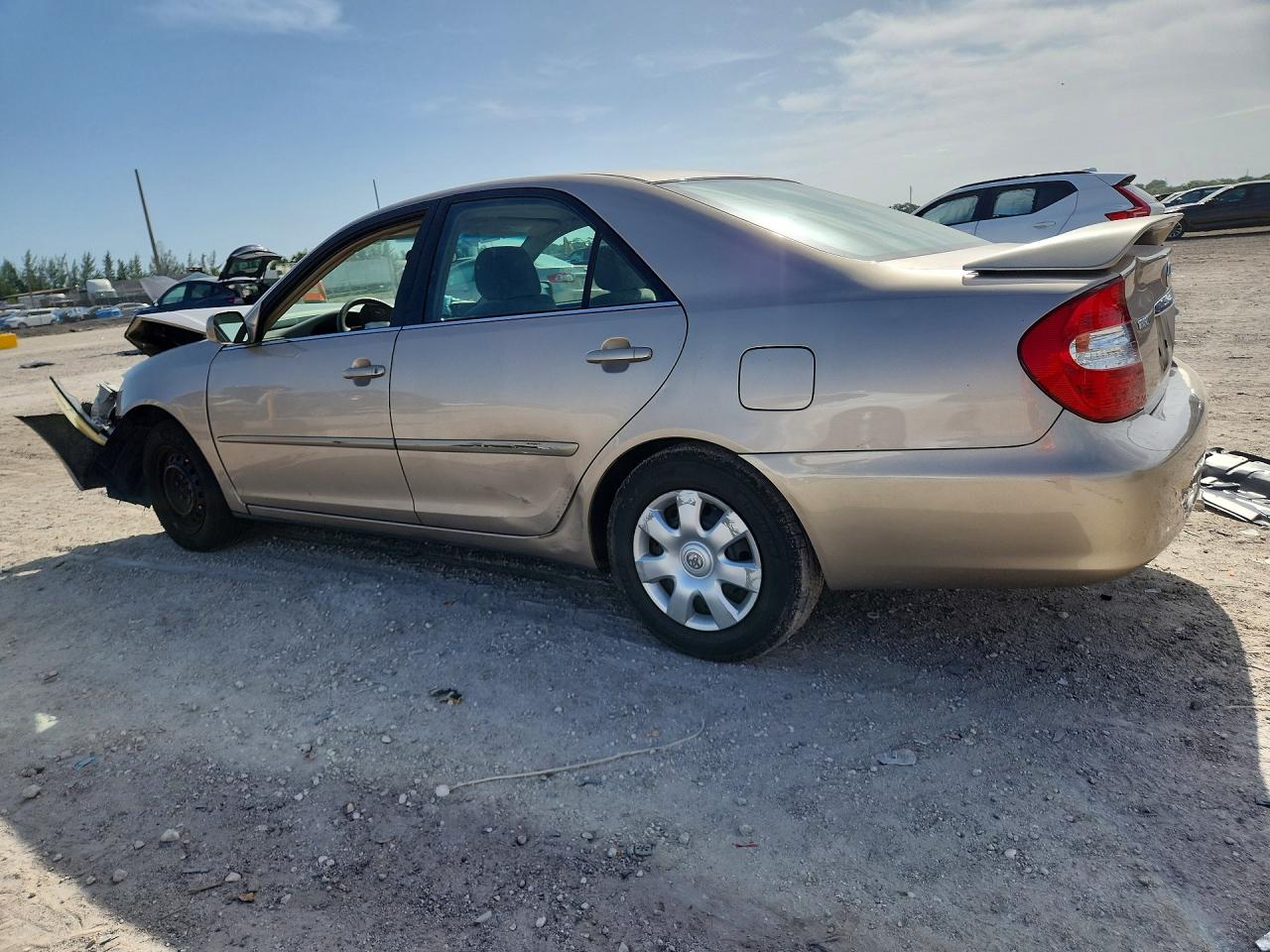 2002 Toyota Camry Le Желто-коричневый vin: 4T1BE32K52U014090