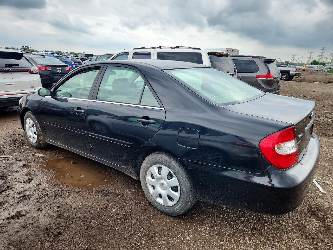 2002 Toyota Camry Le Black vin: 4T1BE32K52U076329