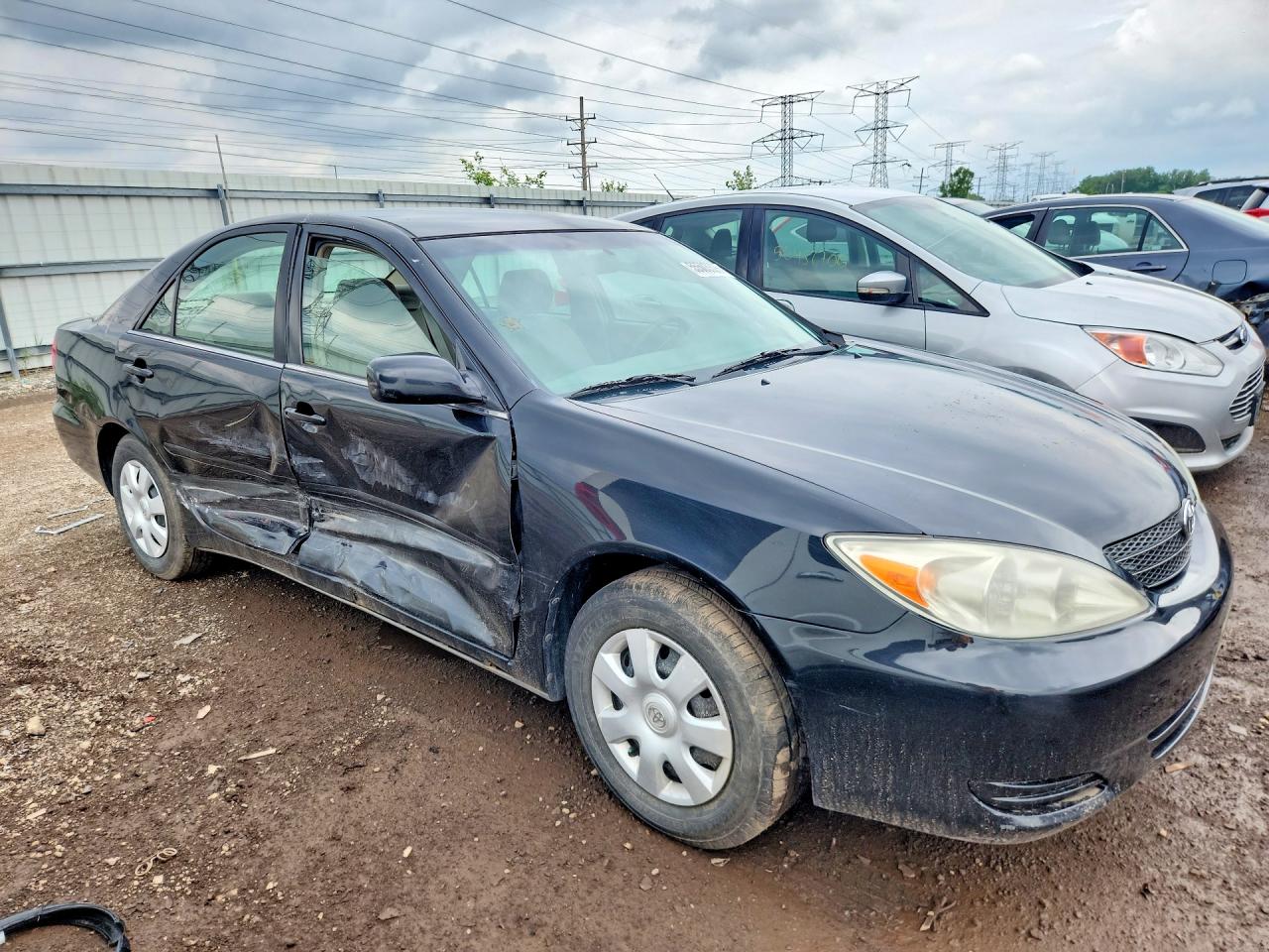 2002 Toyota Camry Le Black vin: 4T1BE32K52U076329