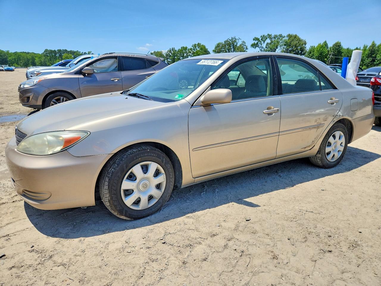 2002 Toyota Camry Le Tan vin: 4T1BE32K52U505663