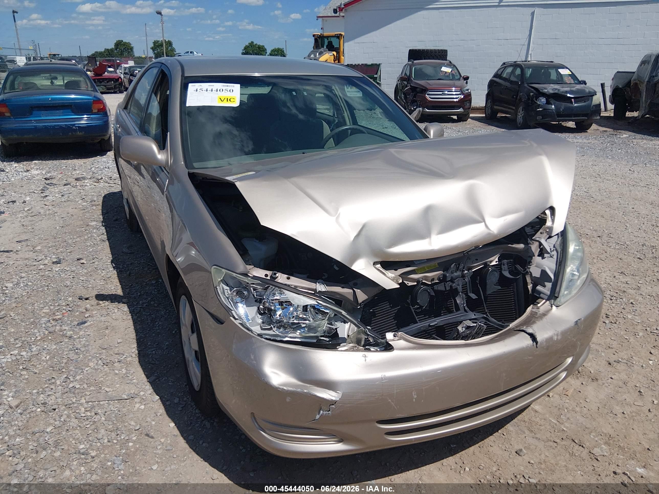 2004 Toyota Camry Le Золотой vin: 4T1BE32K54U307636