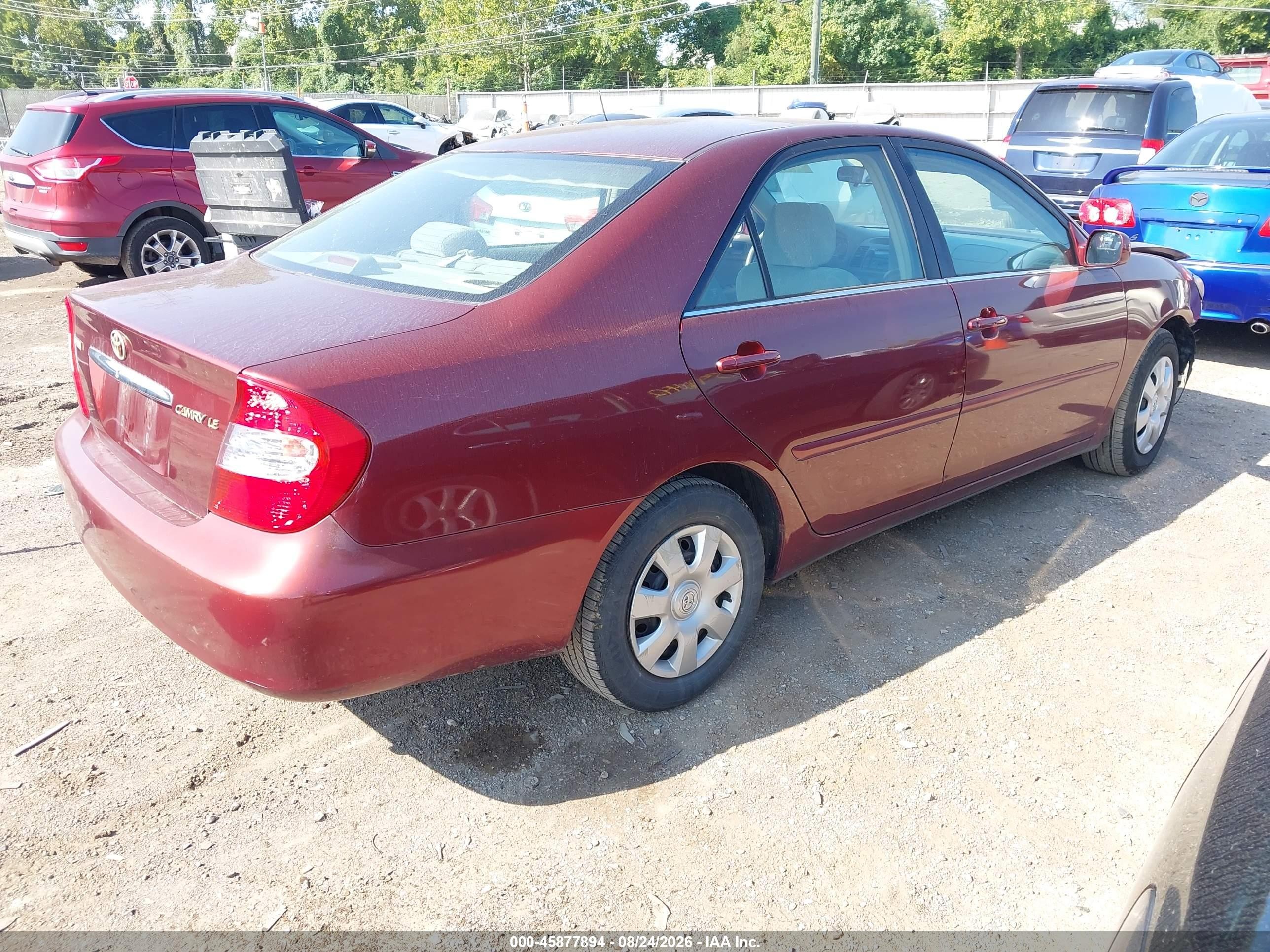 2004 Toyota Camry Le Burgundy vin: 4T1BE32K54U354553