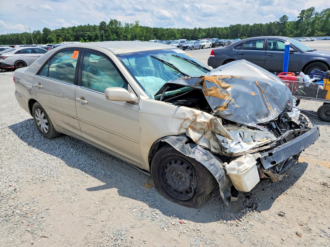 2005 Toyota Camry Le Gold vin: 4T1BE32K65U043442