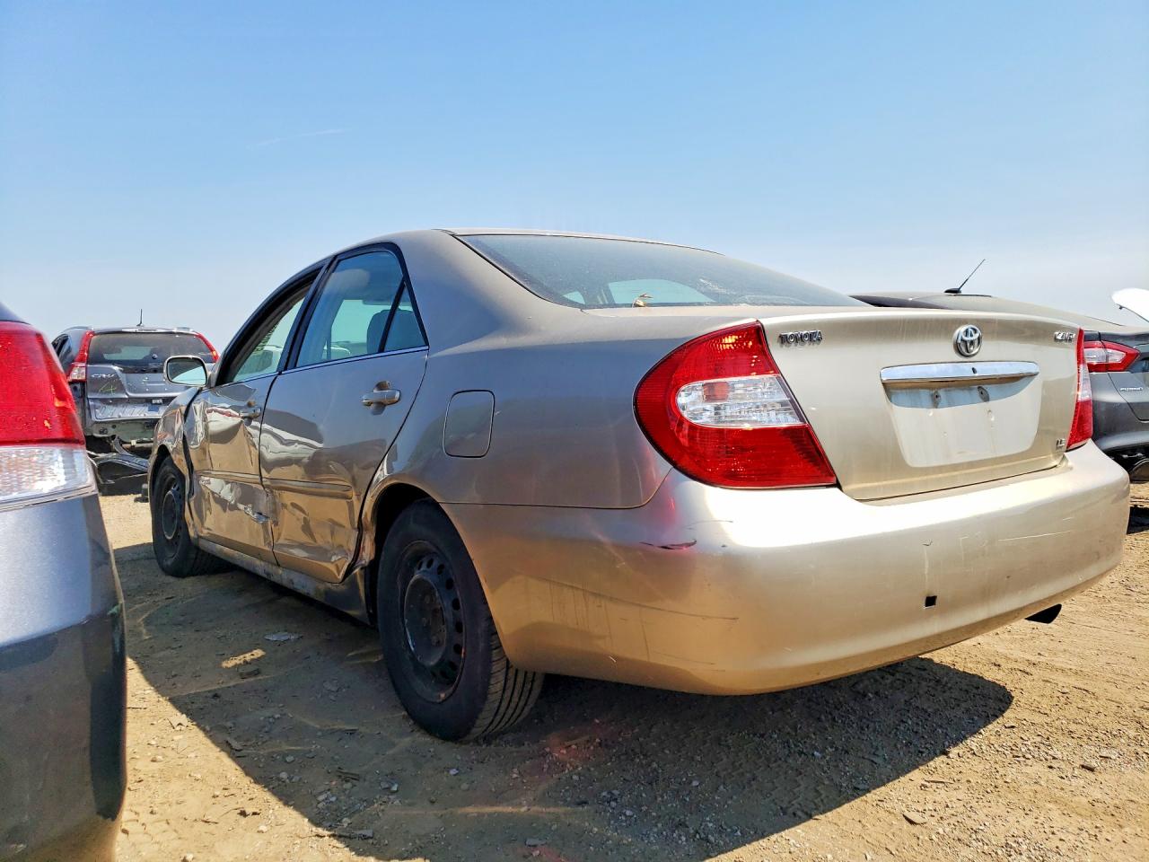 2002 Toyota Camry Le Tan vin: 4T1BE32K72U569638