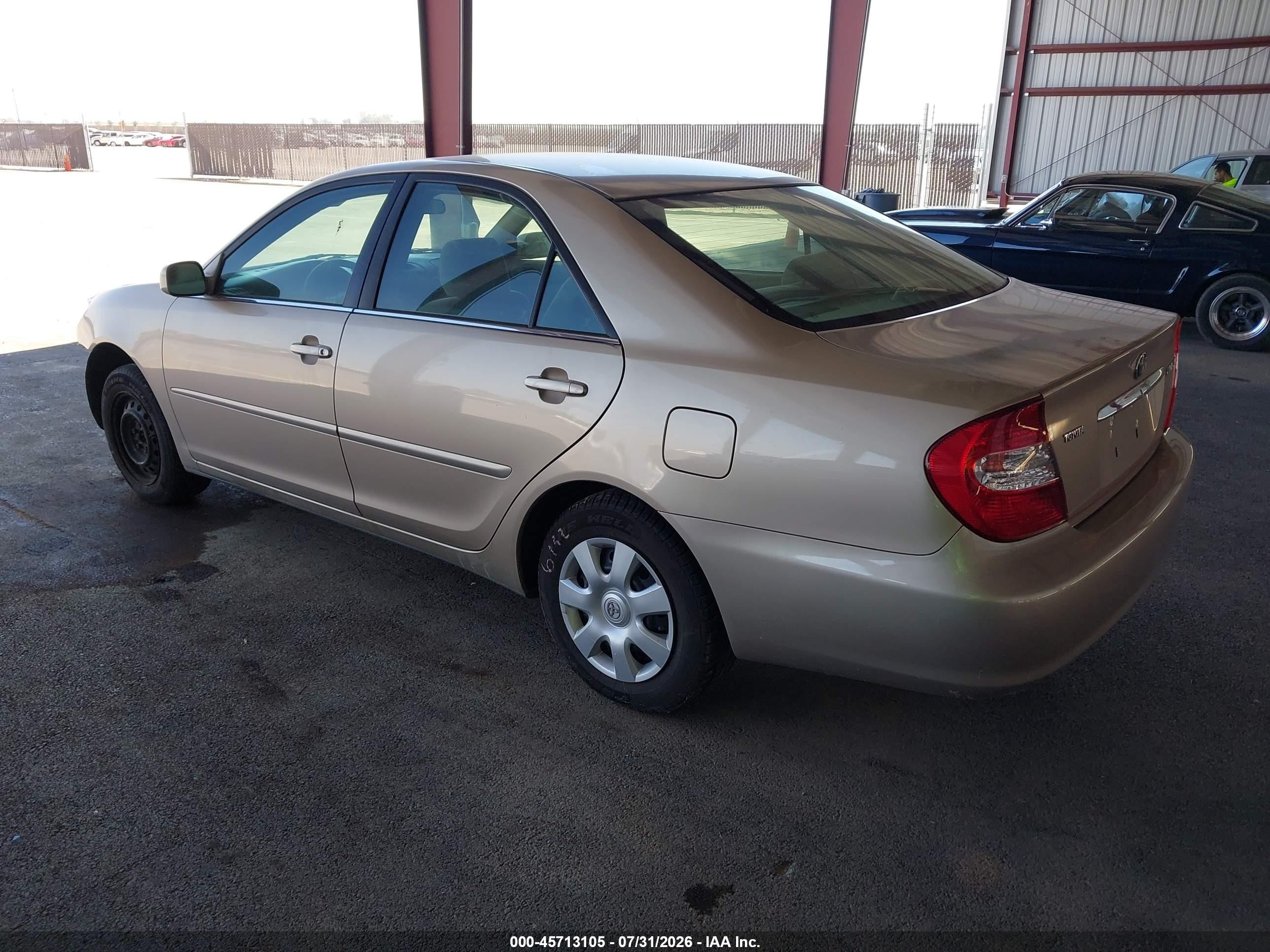 2003 Toyota Camry Le Gold vin: 4T1BE32K73U153588