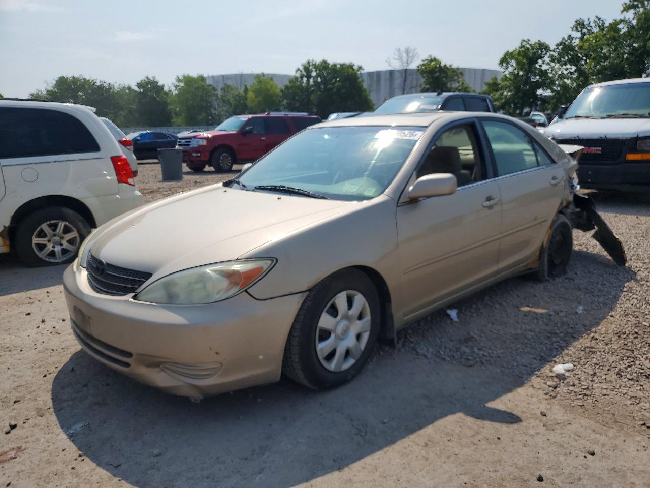 2004 Toyota Camry Le Gold vin: 4T1BE32K74U833508
