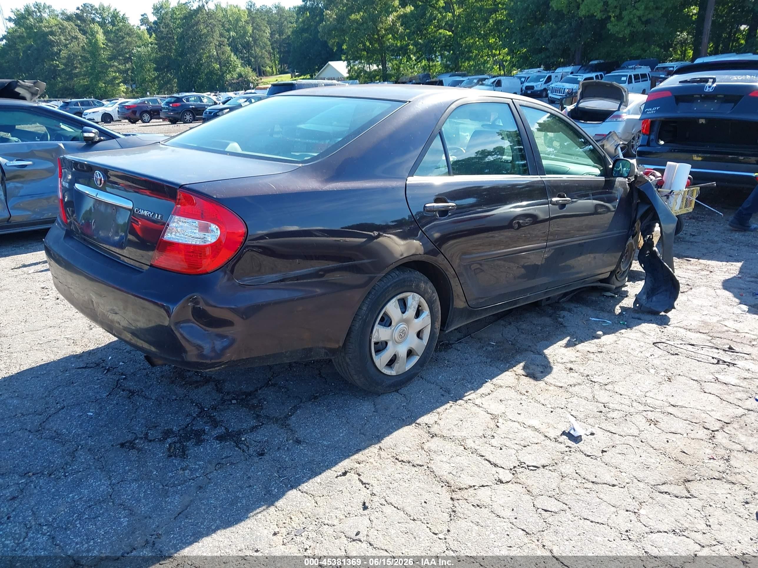 2004 Toyota Camry Le Black vin: 4T1BE32K74U900558