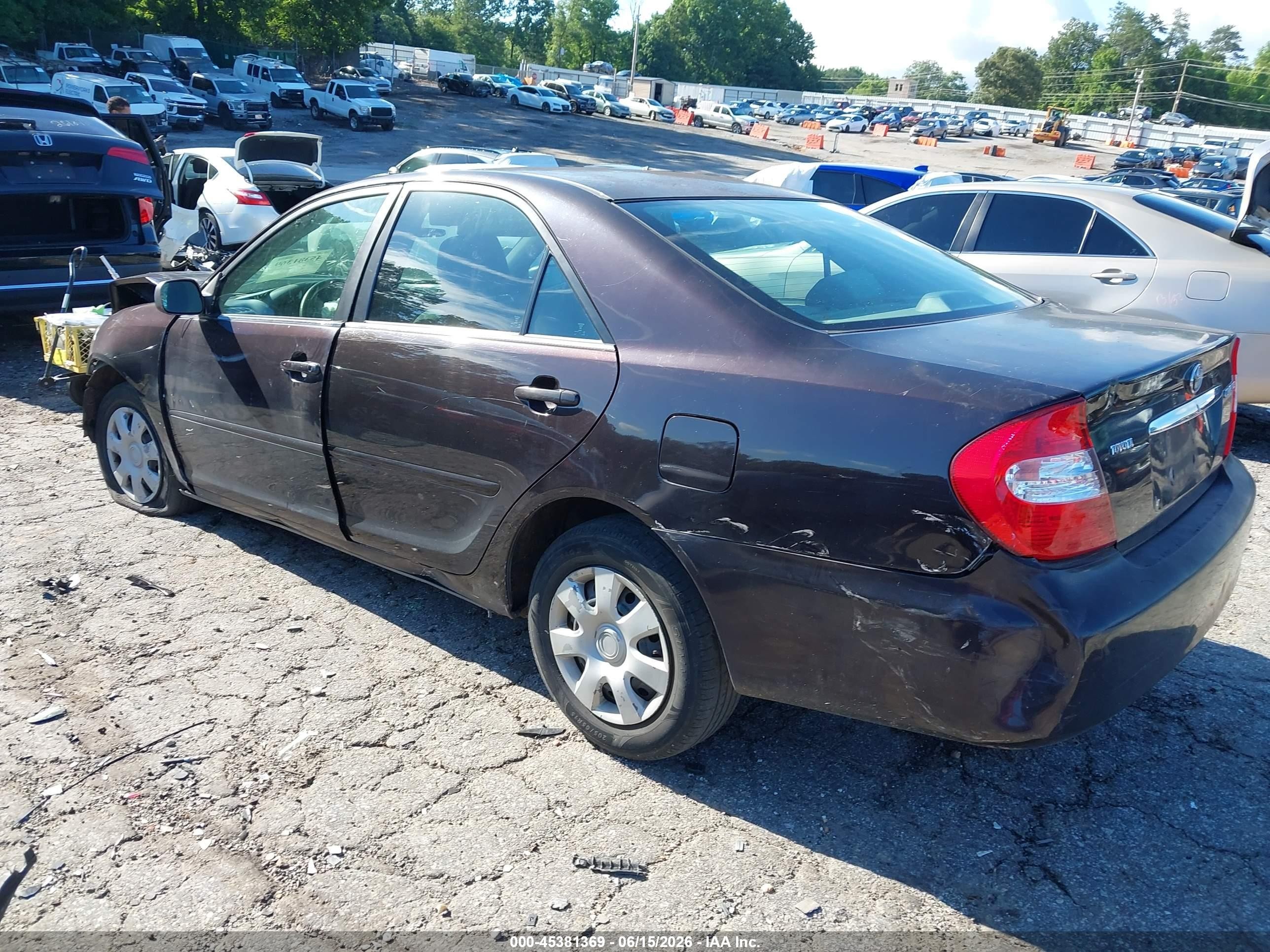 2004 Toyota Camry Le Black vin: 4T1BE32K74U900558