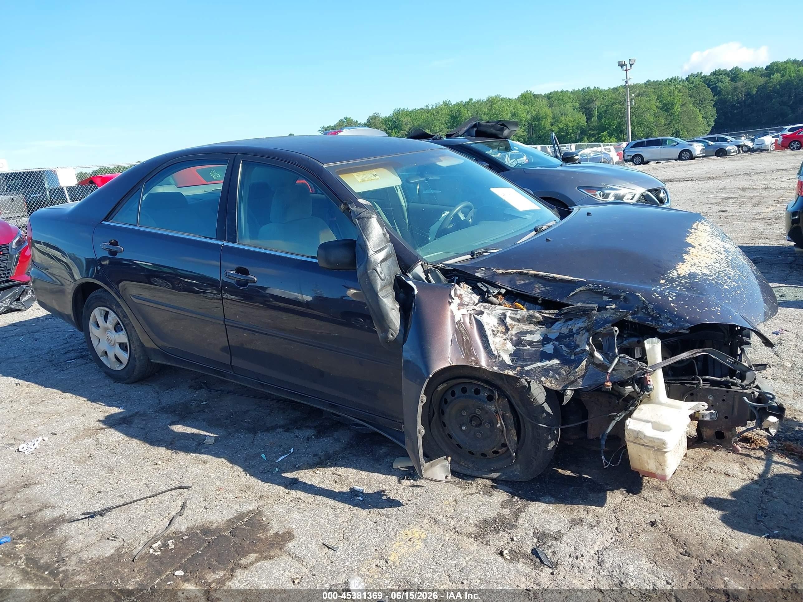 2004 Toyota Camry Le Black vin: 4T1BE32K74U900558