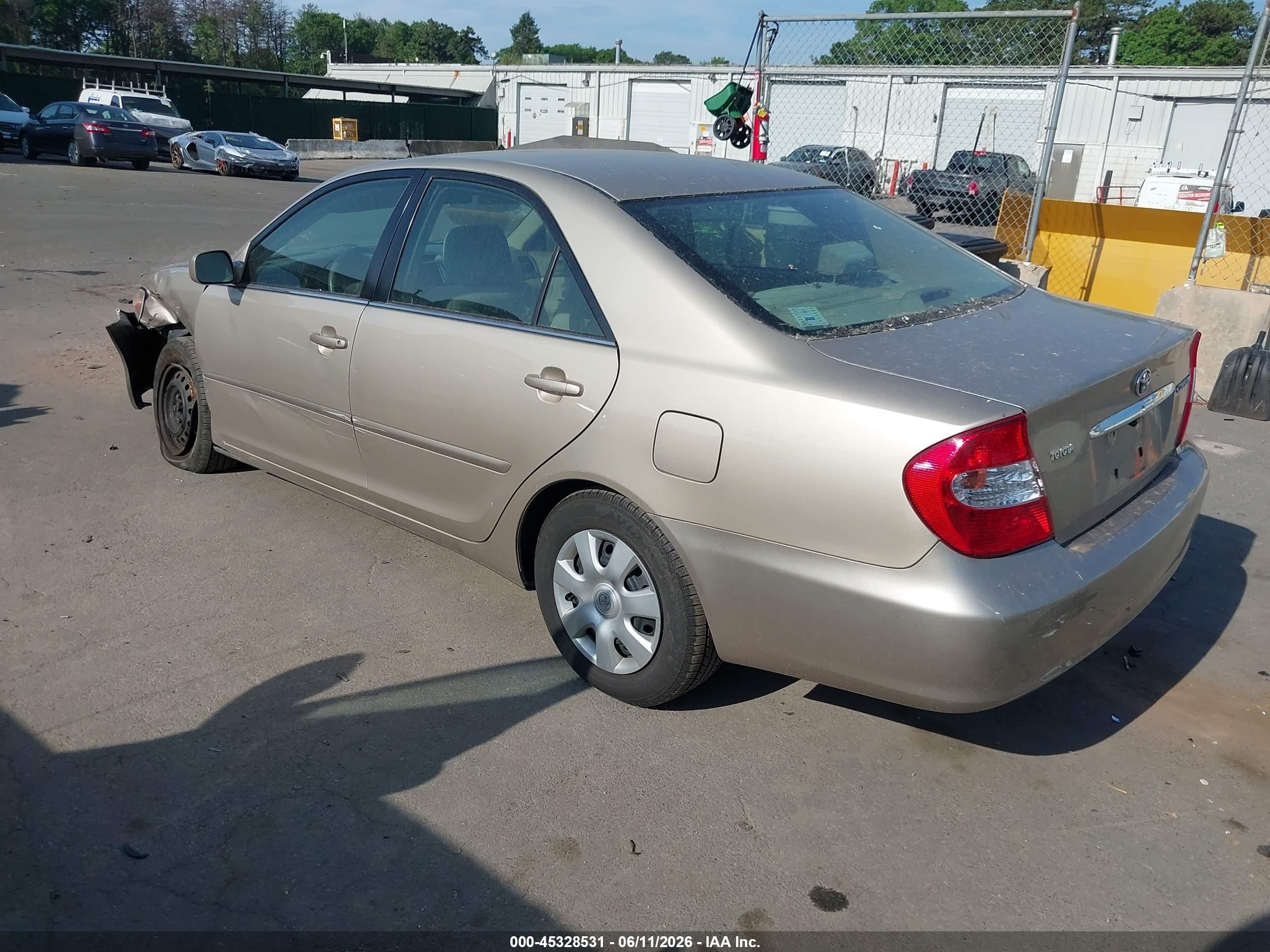 2004 Toyota Camry Le Champagne vin: 4T1BE32K84U931396