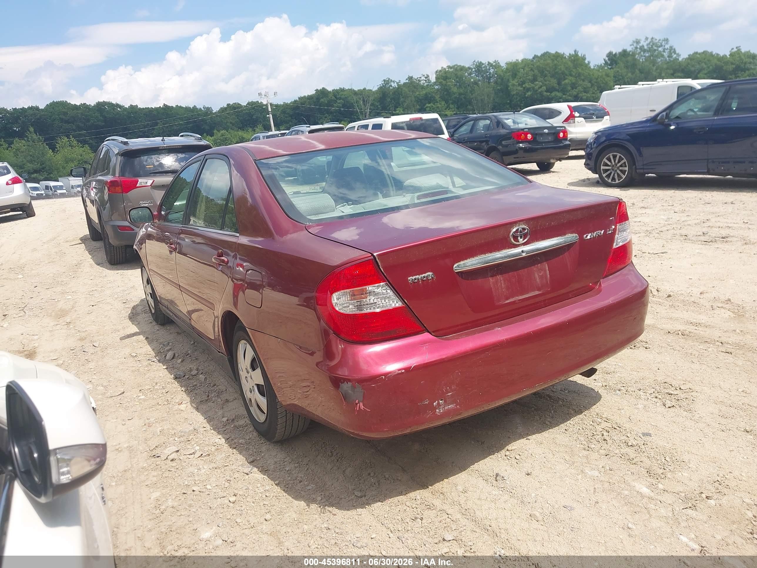 2002 Toyota Camry Le Red vin: 4T1BE32K92U075166