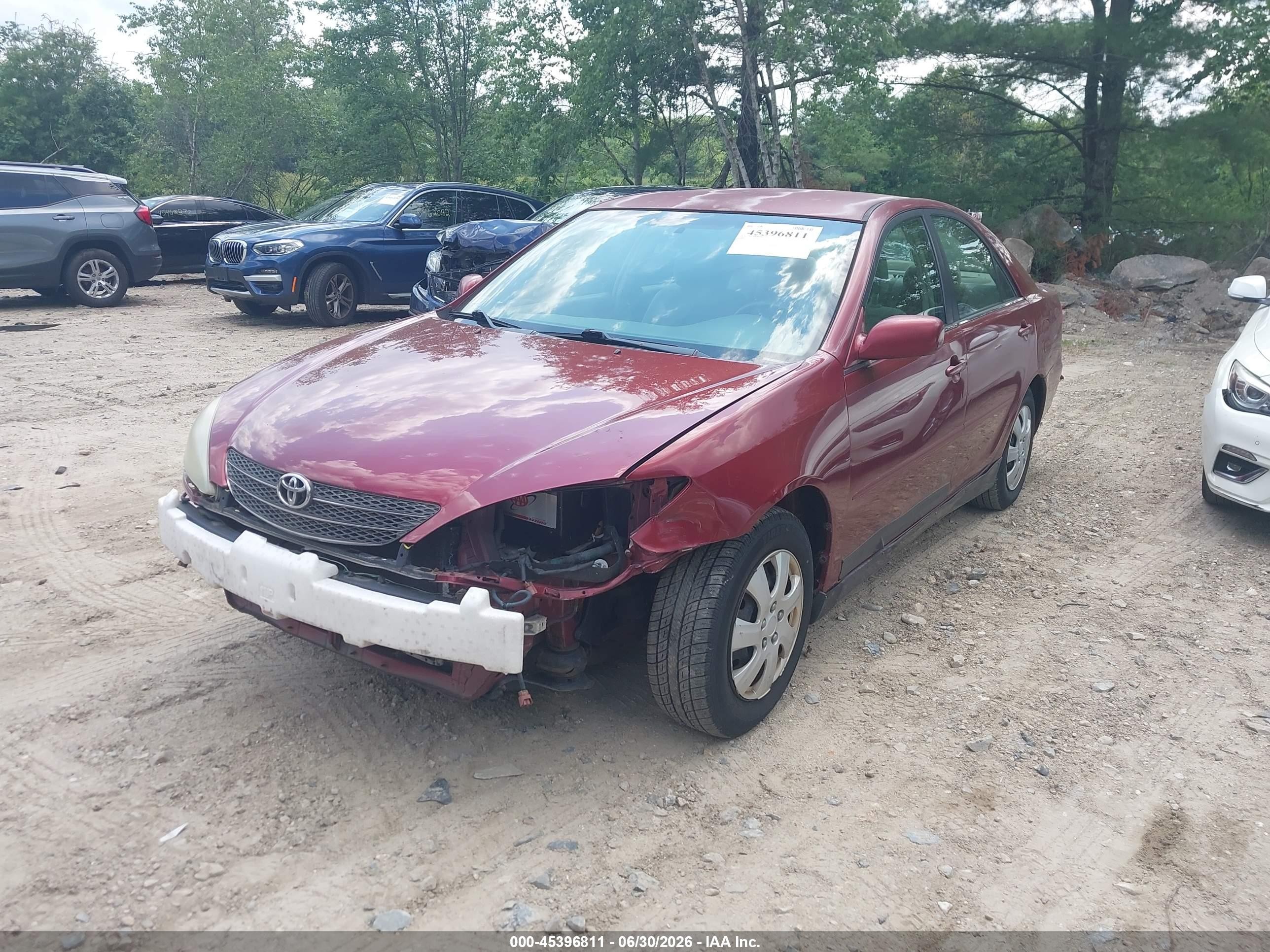 2002 Toyota Camry Le Red vin: 4T1BE32K92U075166