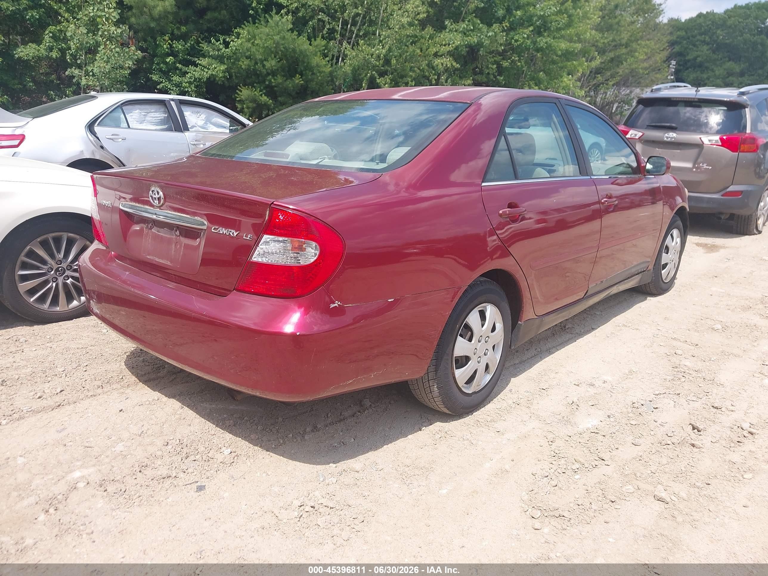 2002 Toyota Camry Le Red vin: 4T1BE32K92U075166
