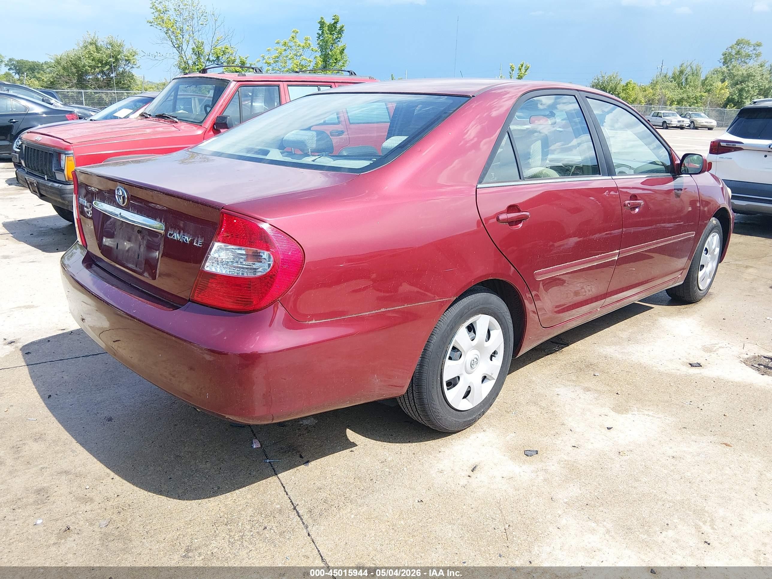 2002 Toyota Camry Le Red vin: 4T1BE32K92U590104