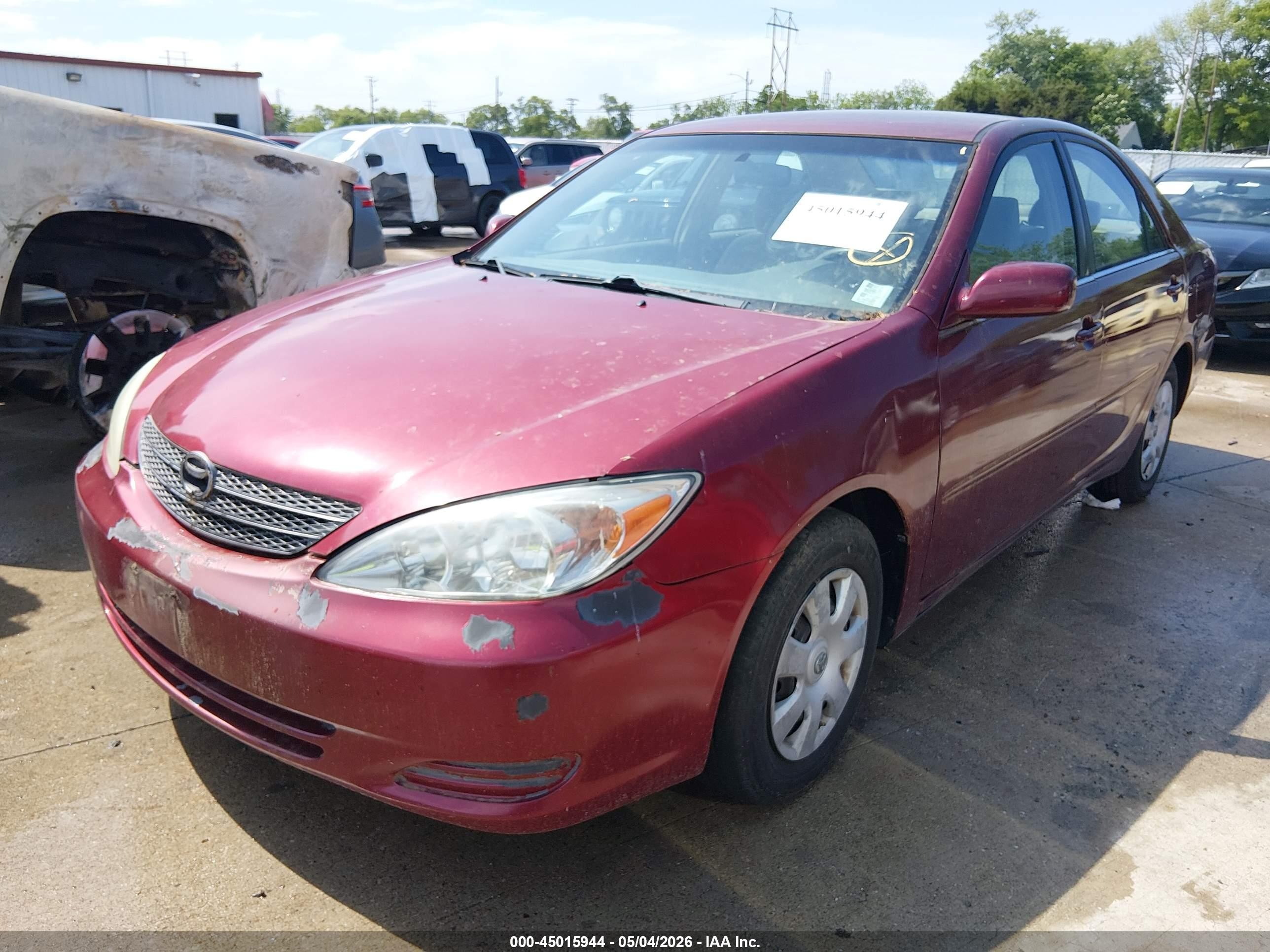 2002 Toyota Camry Le Red vin: 4T1BE32K92U590104