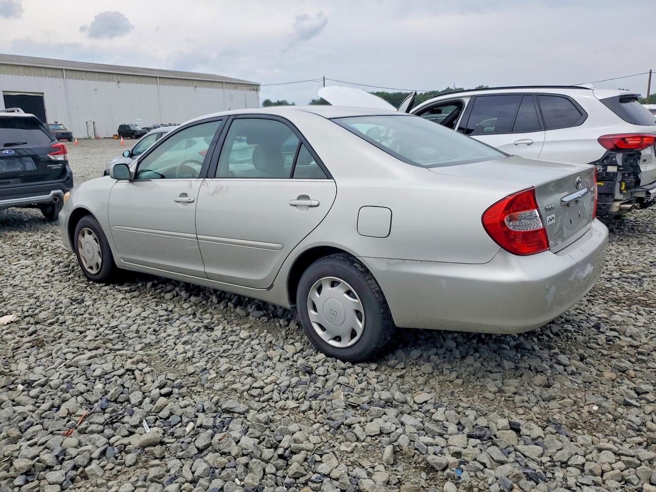 2002 Toyota Camry Le Beige vin: 4T1BE32KX2U007250