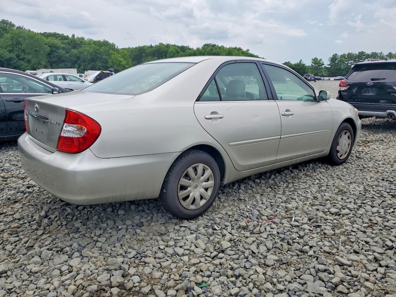 2002 Toyota Camry Le Beige vin: 4T1BE32KX2U007250