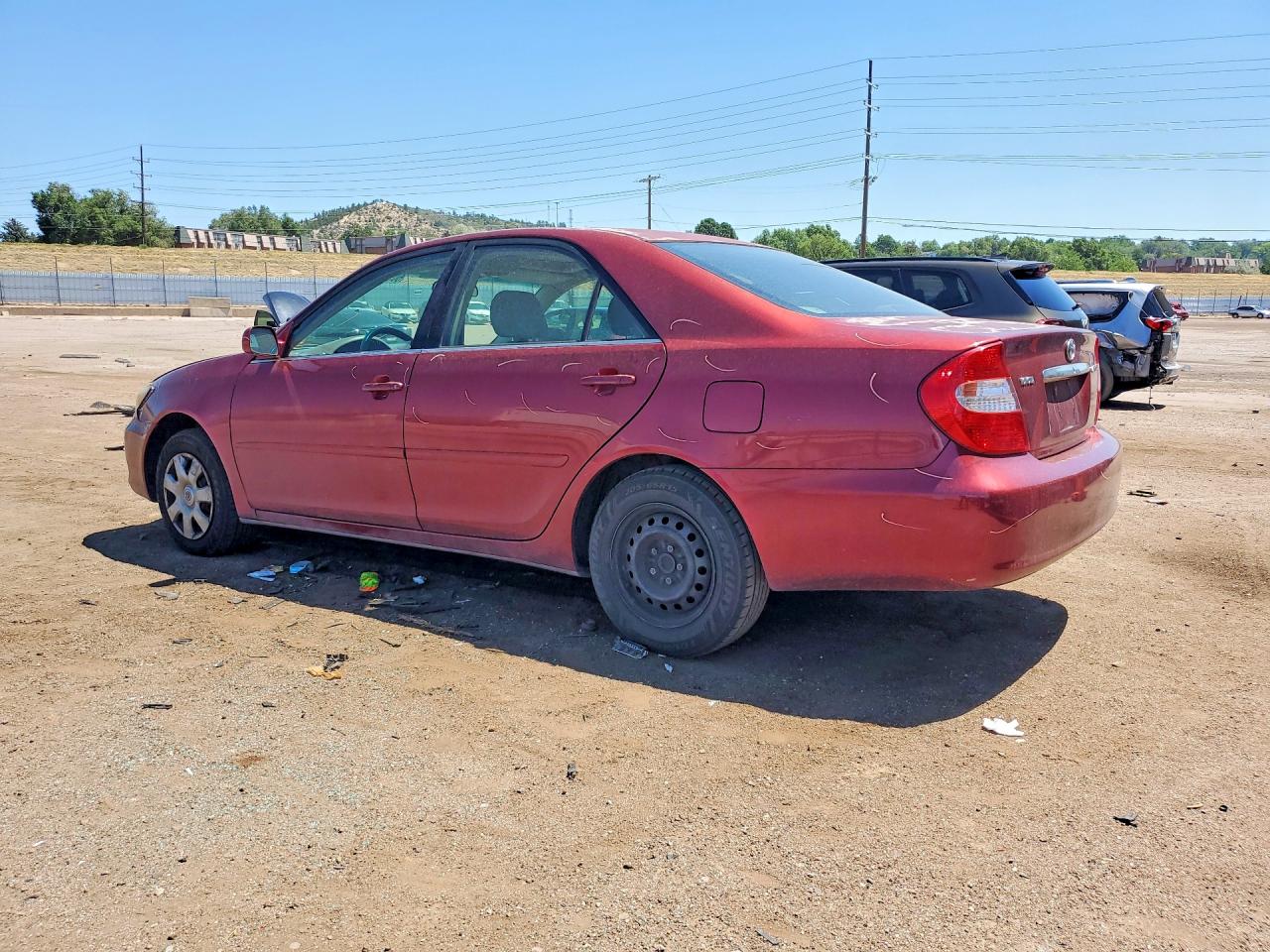 2003 Toyota Camry Le Red vin: 4T1BE32KX3U189985