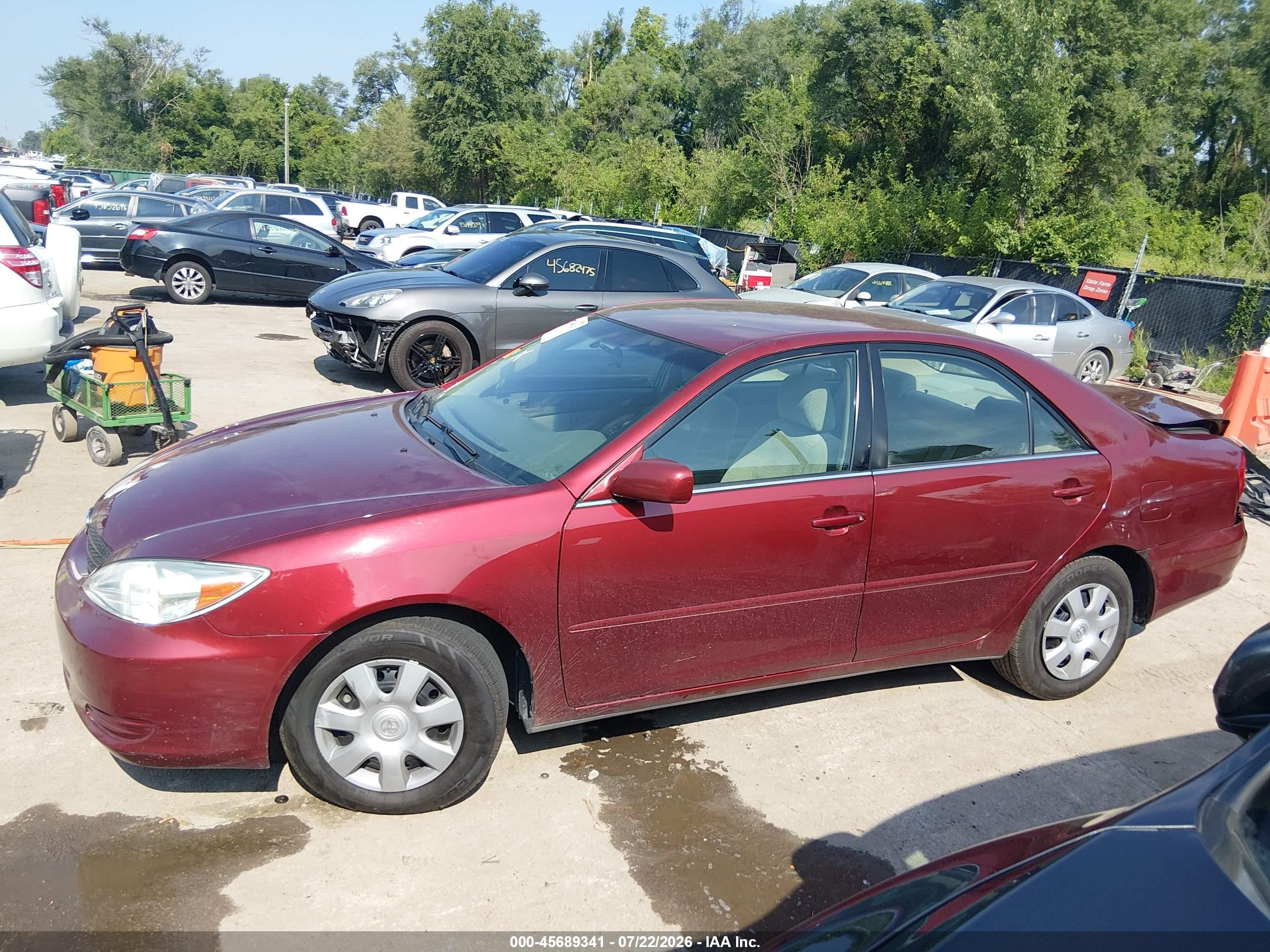 2003 Toyota Camry Le Red vin: 4T1BE32KX3U241941