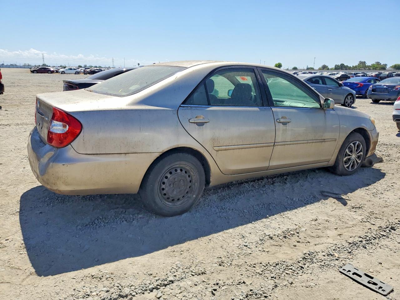 2004 Toyota Camry Le Tan vin: 4T1BE32KX4U292356