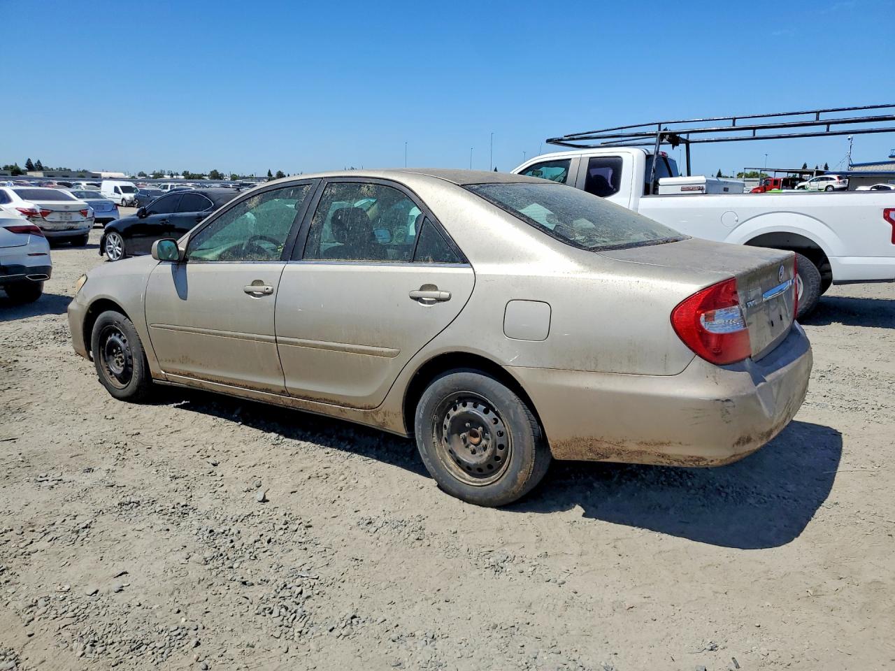 2004 Toyota Camry Le Tan vin: 4T1BE32KX4U292356
