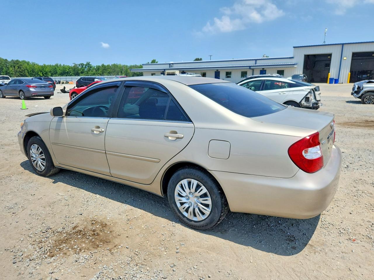 2004 Toyota Camry Le Tan vin: 4T1BE32KX4U292891