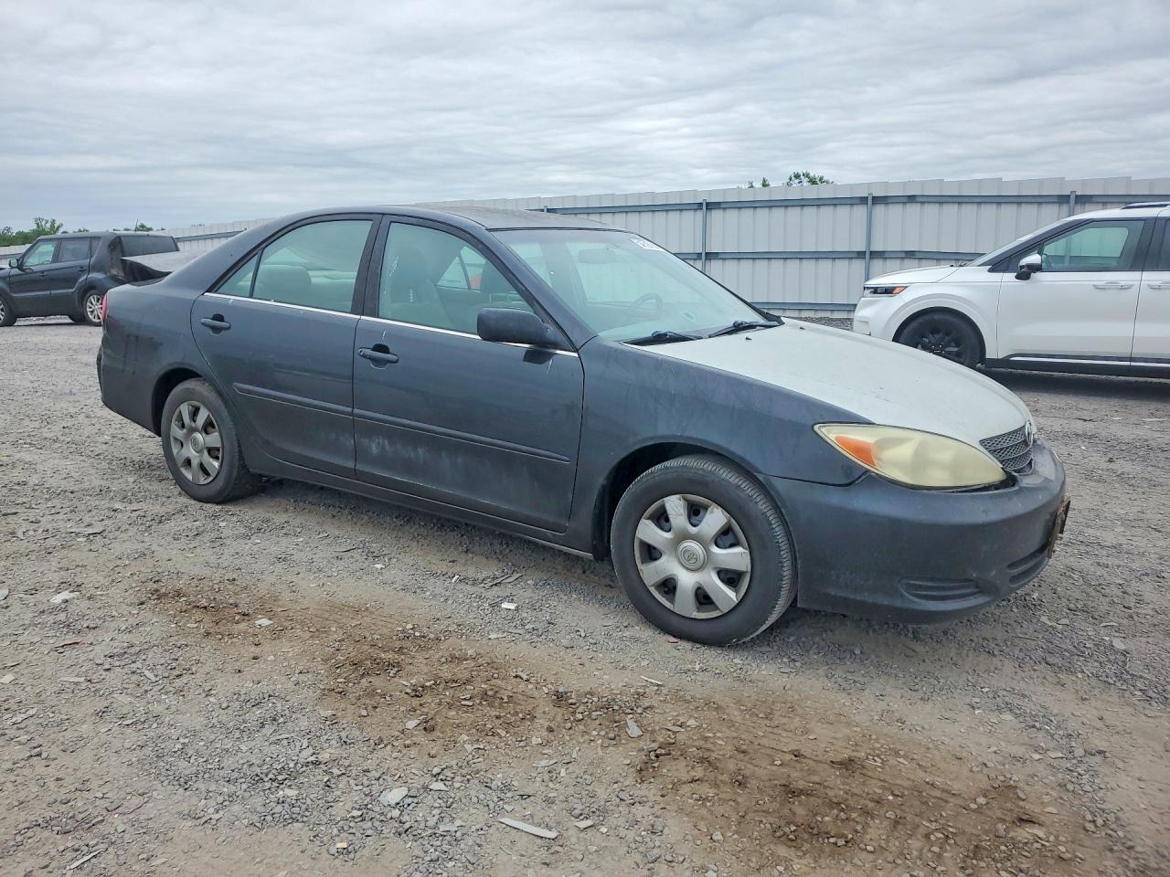 2004 Toyota Camry Le Black vin: 4T1BE32KX4U310726