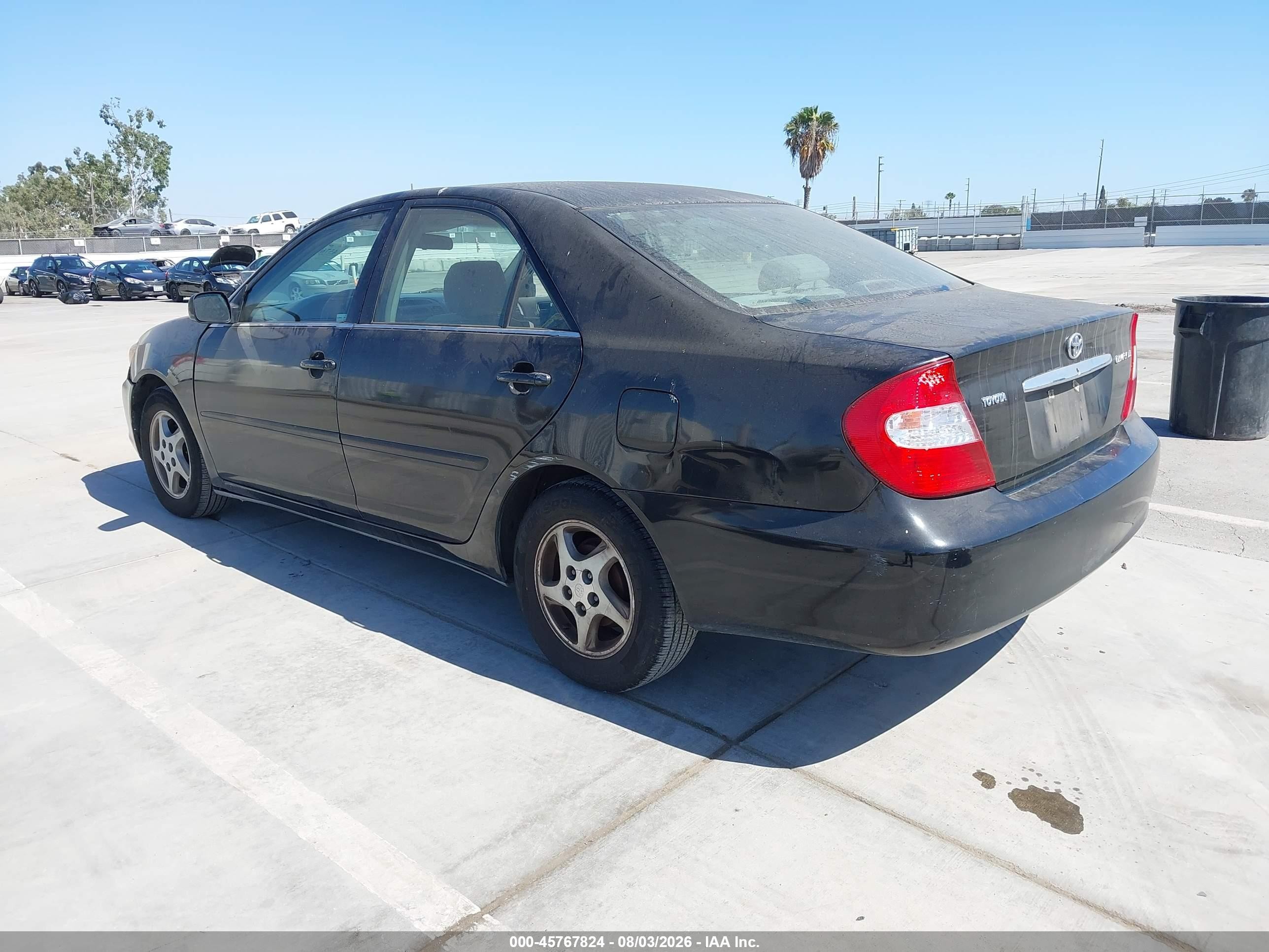 2004 Toyota Camry Le Black vin: 4T1BE32KX4U374491