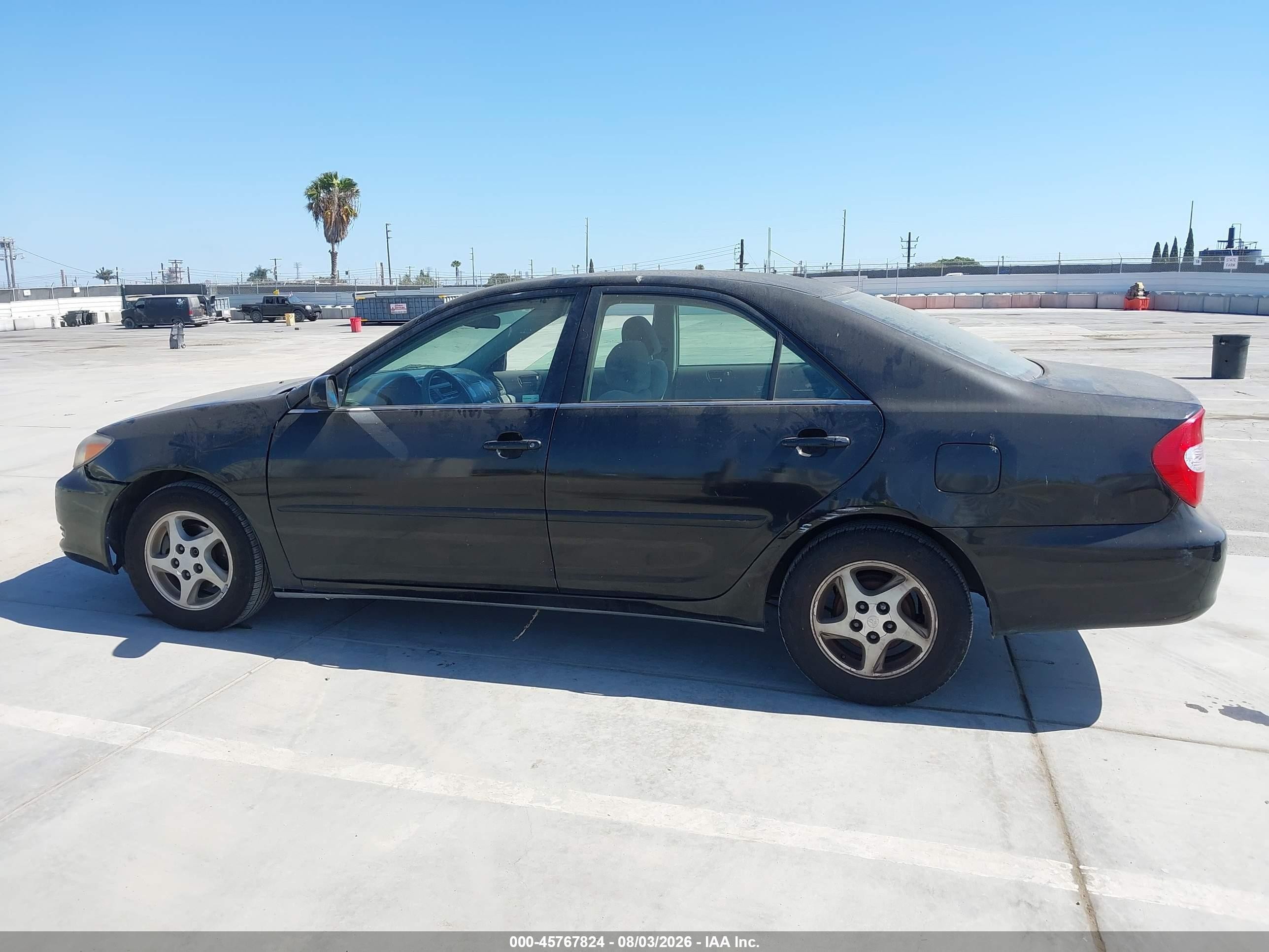 2004 Toyota Camry Le Black vin: 4T1BE32KX4U374491