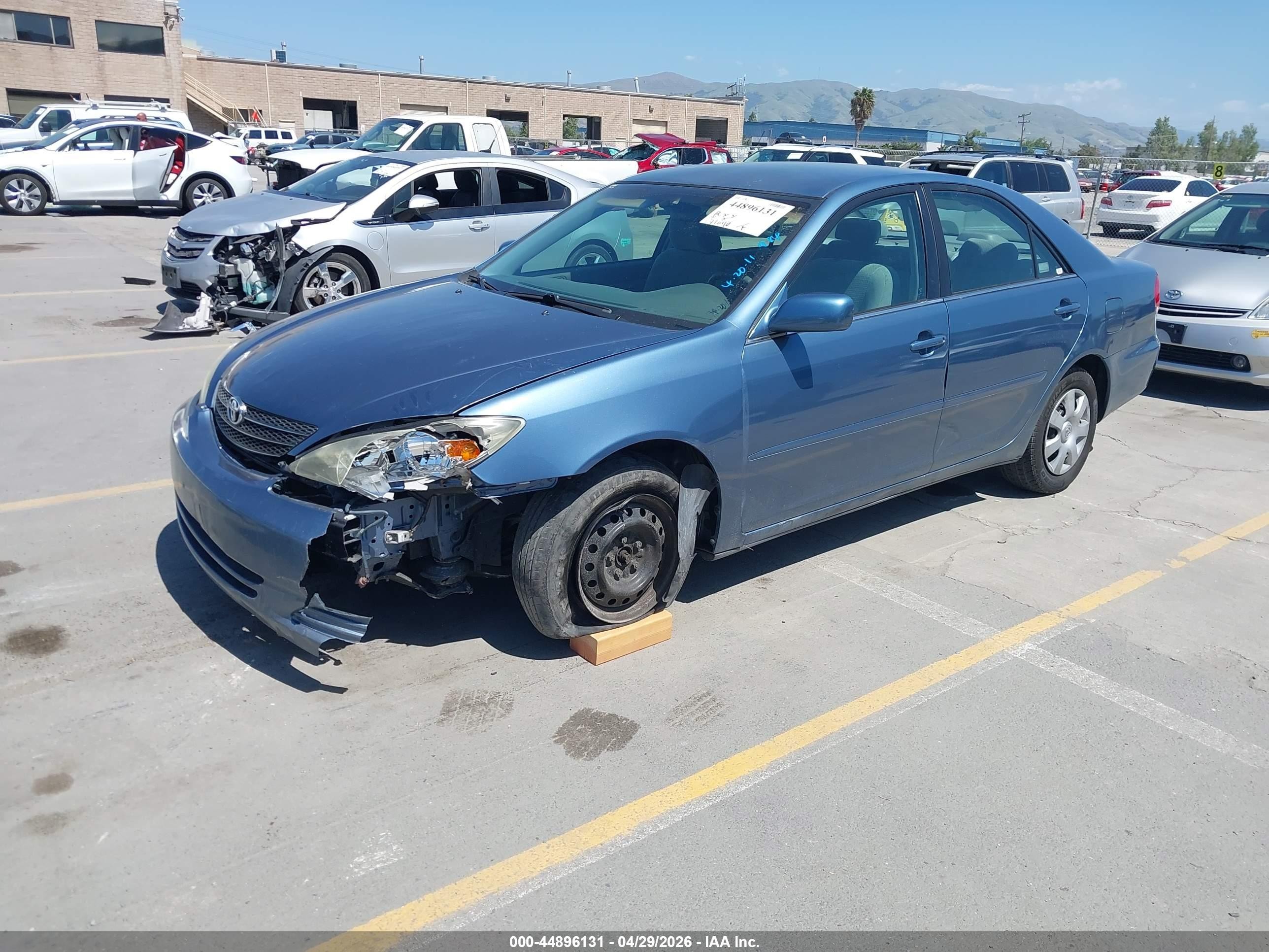 2004 Toyota Camry Le Blue vin: 4T1BE32KX4U919878