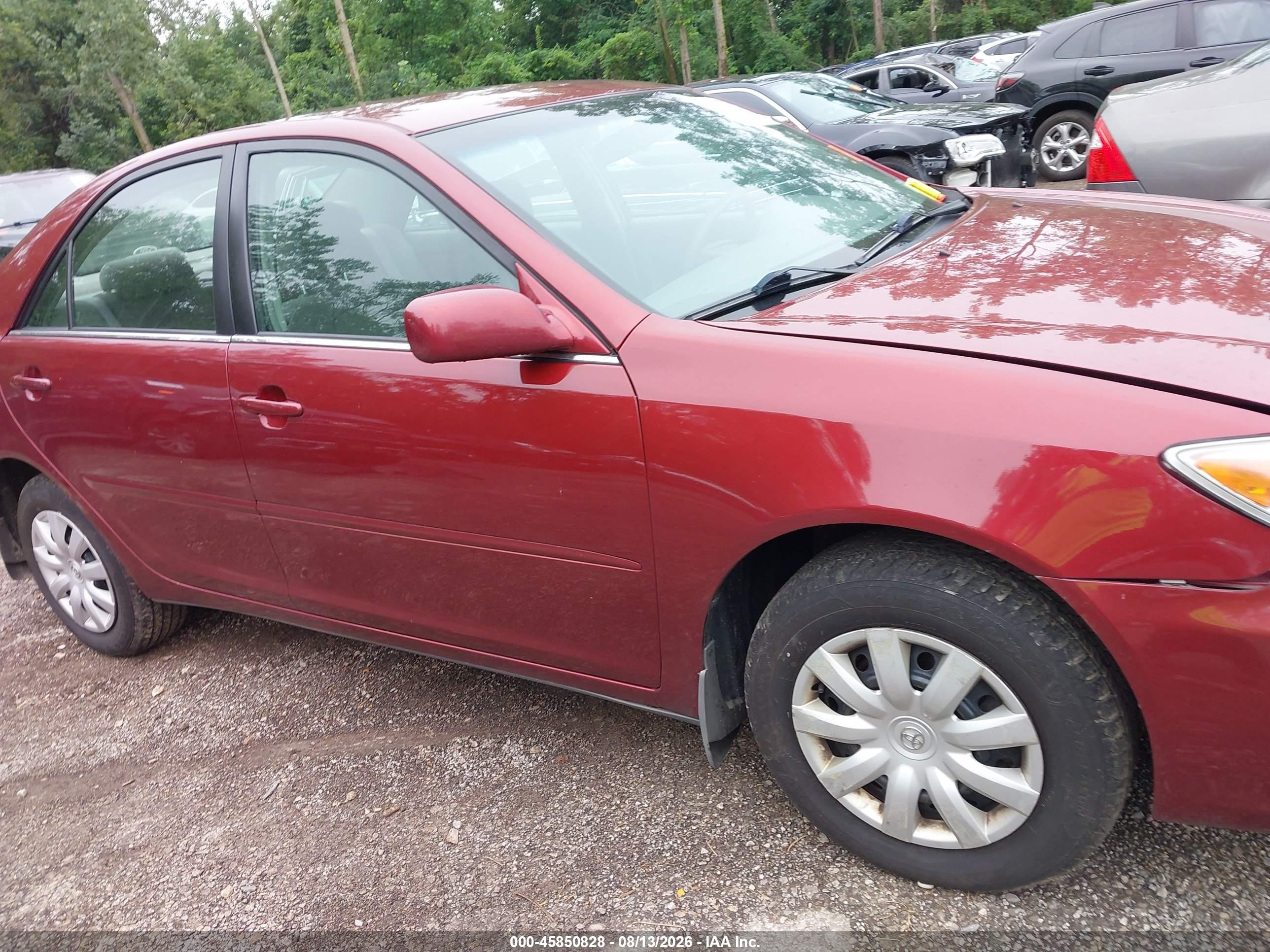 2005 Toyota Camry Le Red vin: 4T1BE32KX5U012954