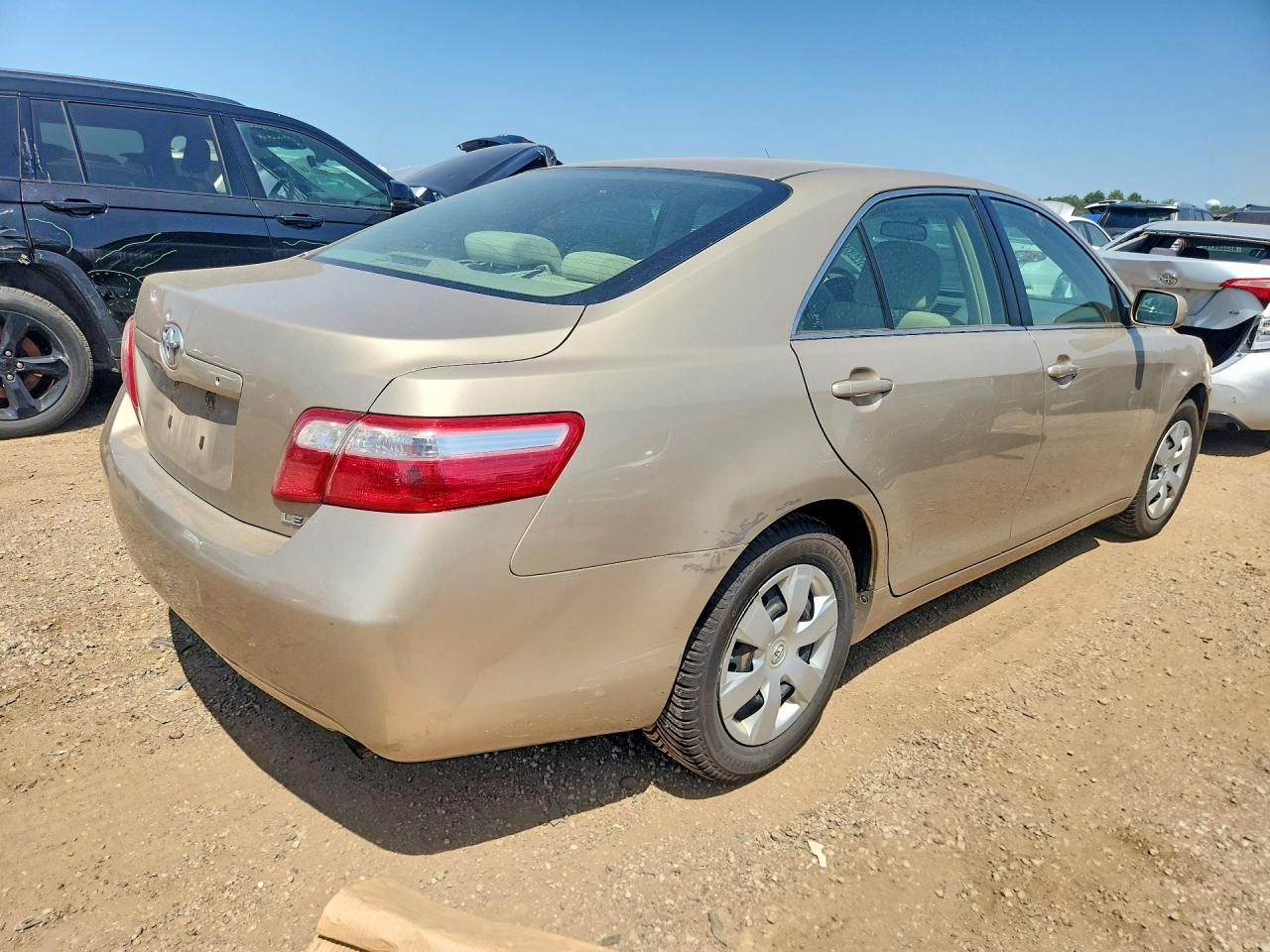 2009 Toyota Camry Le Gold vin: 4T1BE46K29U392300