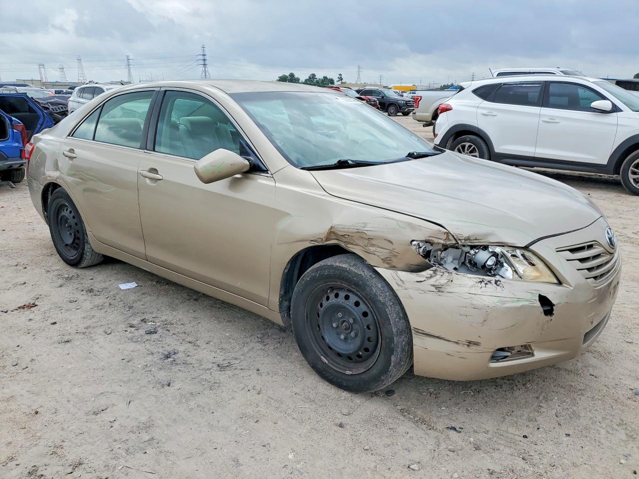 2009 Toyota Camry Le Gold vin: 4T1BE46K29U826392