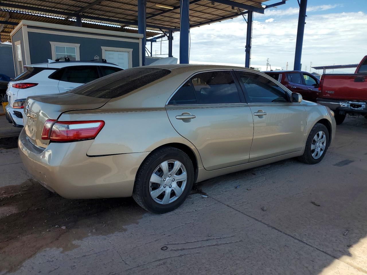 2009 Toyota Camry Le Gold vin: 4T1BE46K49U853674