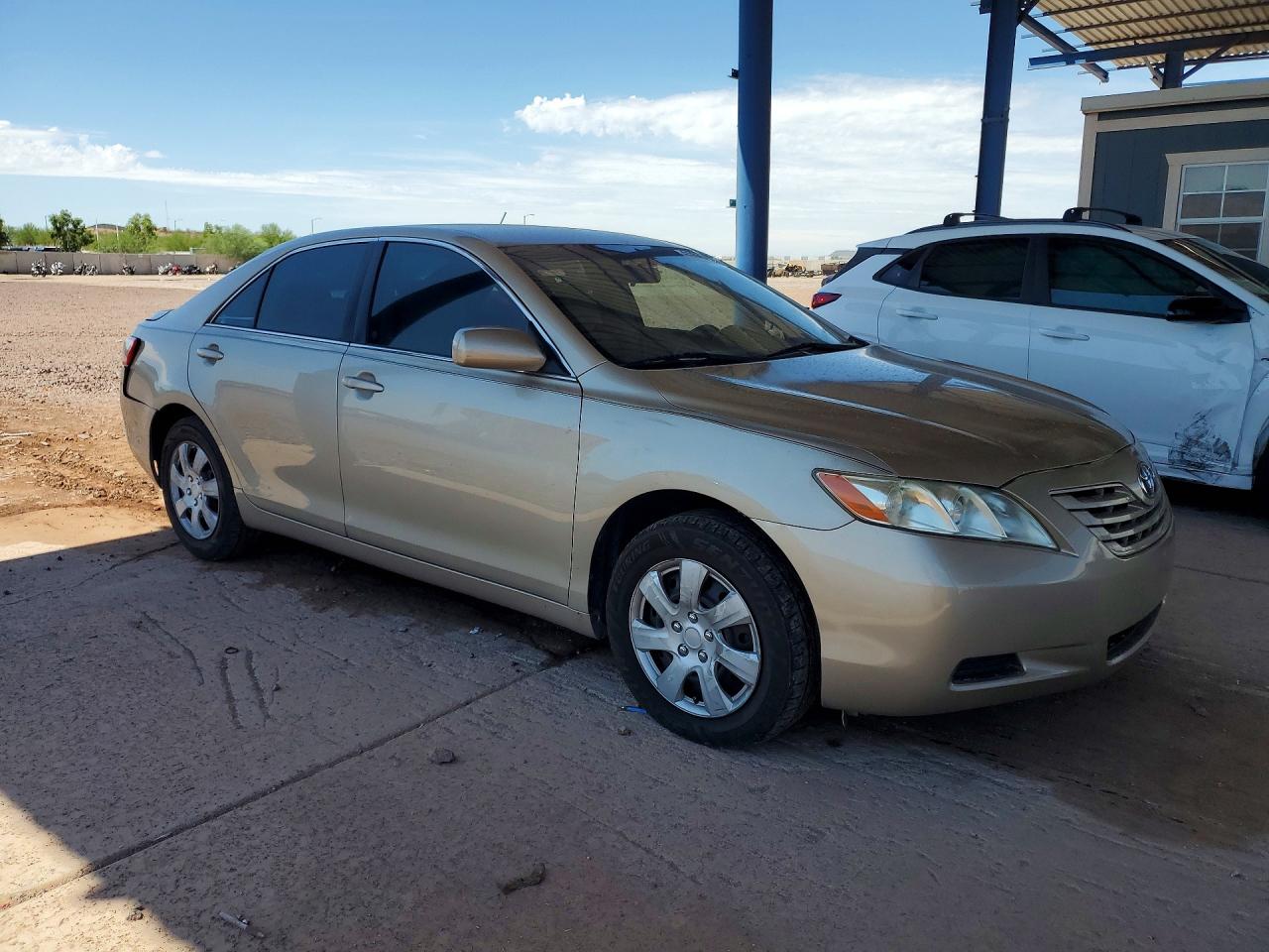 2009 Toyota Camry Le Gold vin: 4T1BE46K49U853674