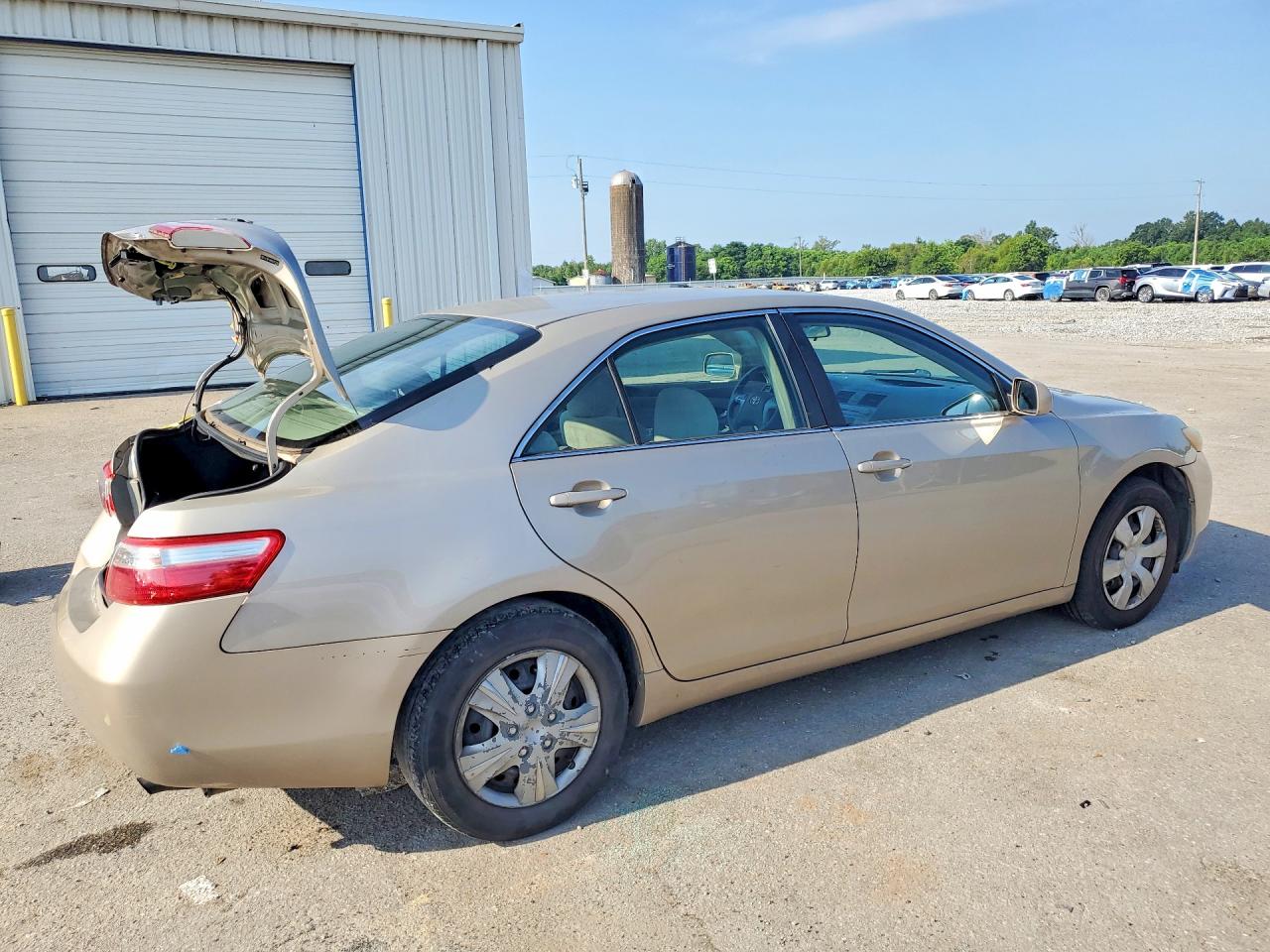 2009 Toyota Camry Le Золотой vin: 4T1BE46K99U812103
