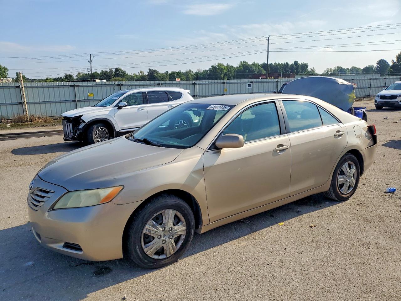 2009 Toyota Camry Le Золотой vin: 4T1BE46K99U812103