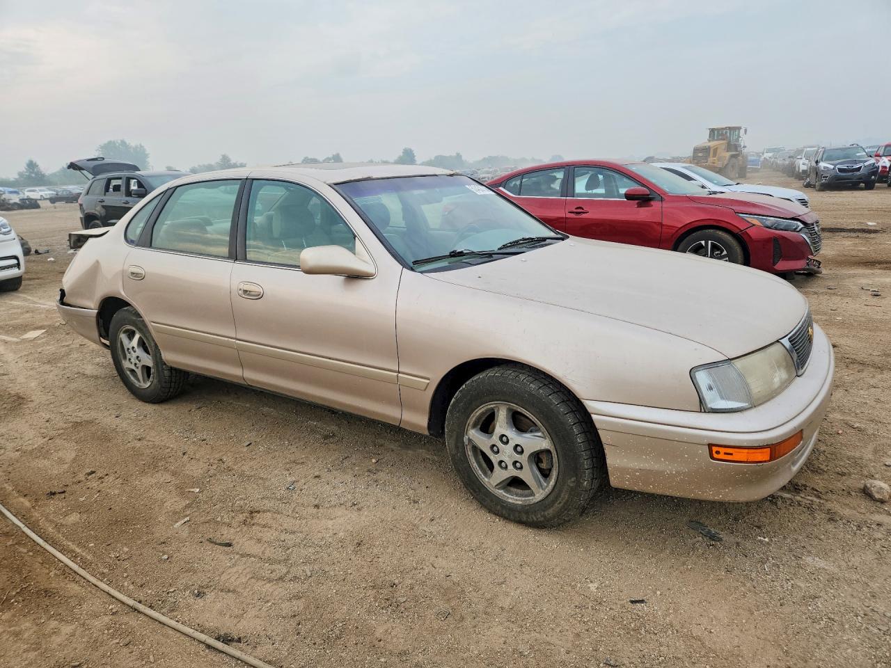 1997 Toyota Avalon Xl Tan vin: 4T1BF12B2VU164311