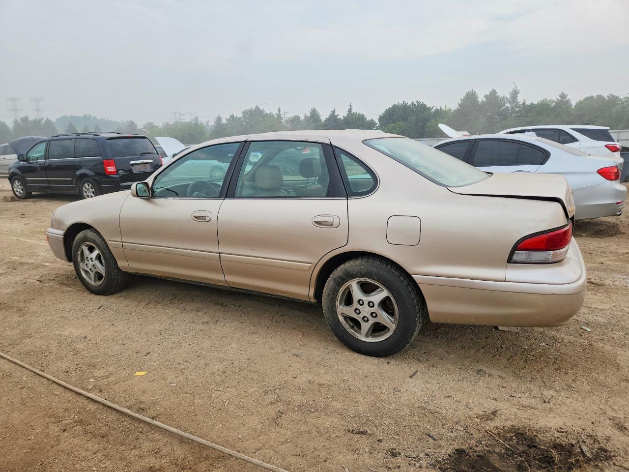 1997 Toyota Avalon Xl Tan vin: 4T1BF12B2VU164311