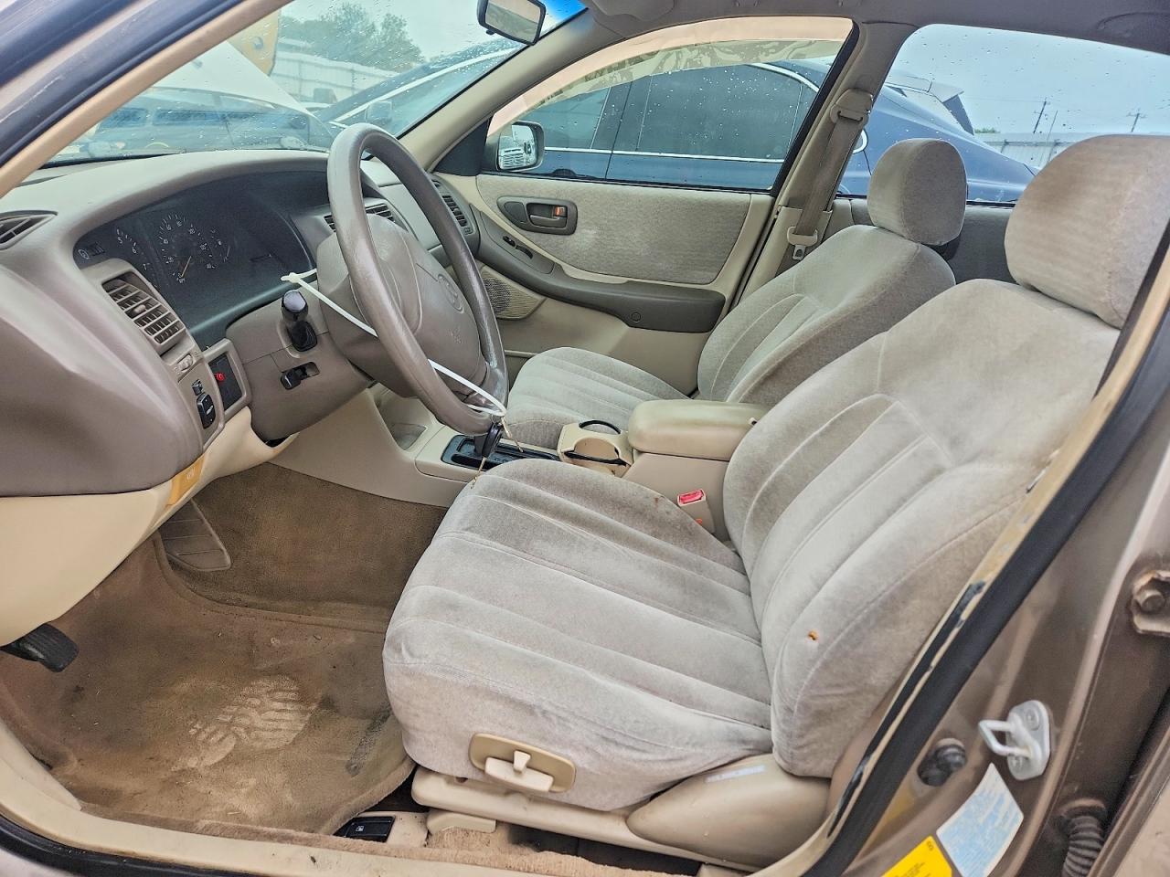 1999 Toyota Avalon Xl Tan vin: 4T1BF18B1XU324950