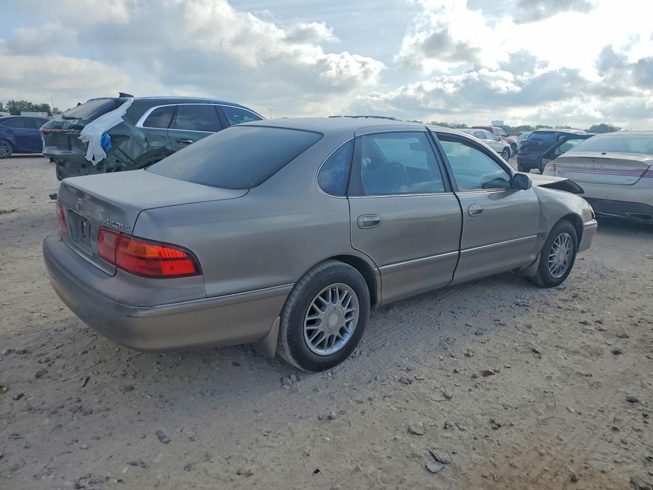 1999 Toyota Avalon Xl Tan vin: 4T1BF18B1XU324950
