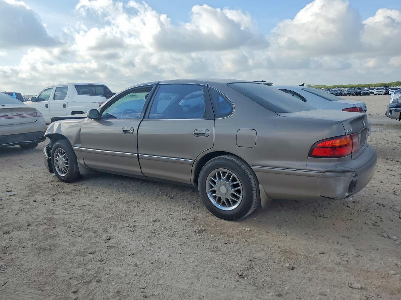 1999 Toyota Avalon Xl Tan vin: 4T1BF18B1XU324950